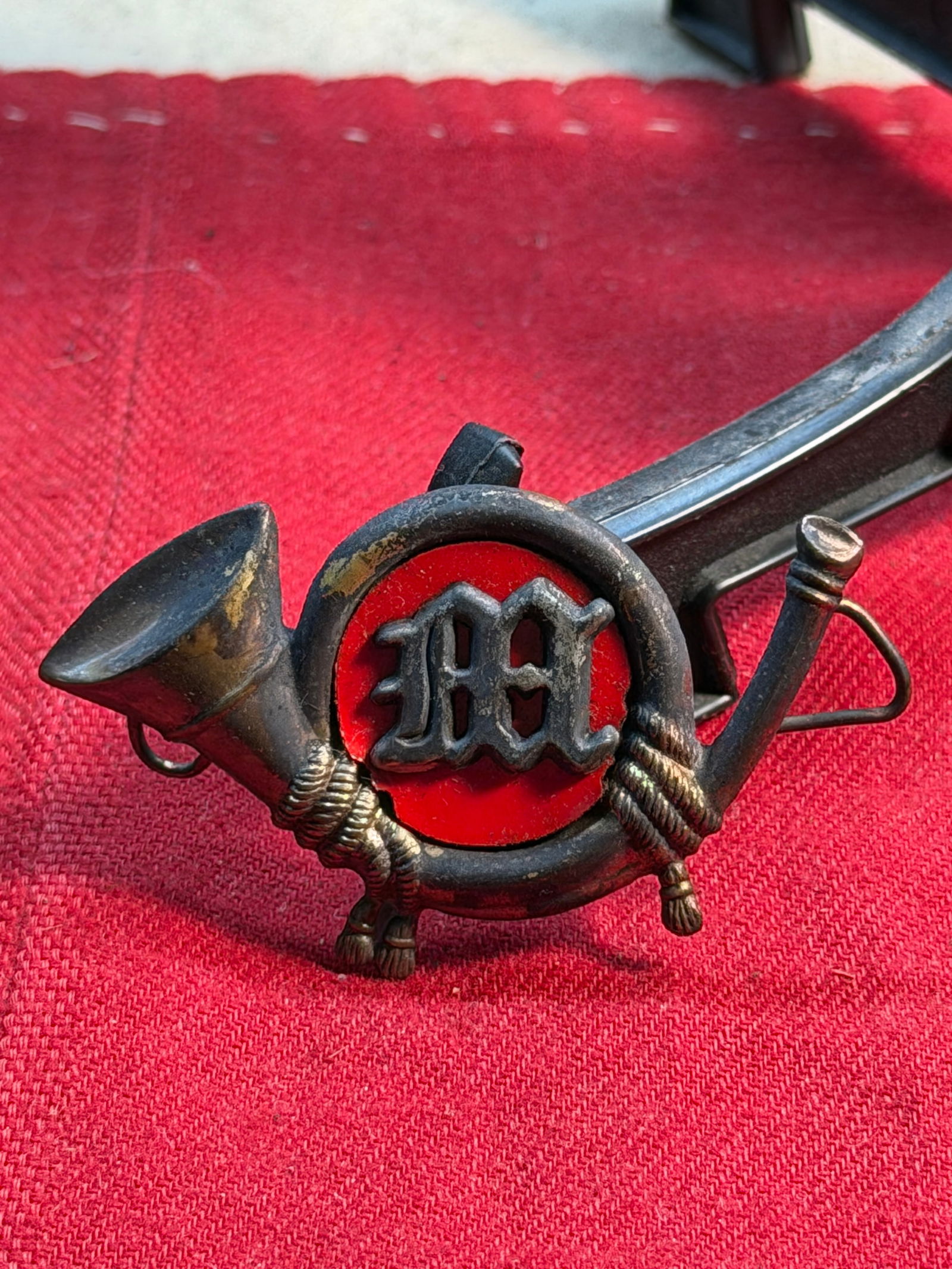 Civil War USMC Marine Corps Headgear Badge Insignia: This finely crafted Civil War–era United States Marine Corps headgear badge insignia features a small French horn motif centered around a bold “M,” representing the Marines. Fashioned from c