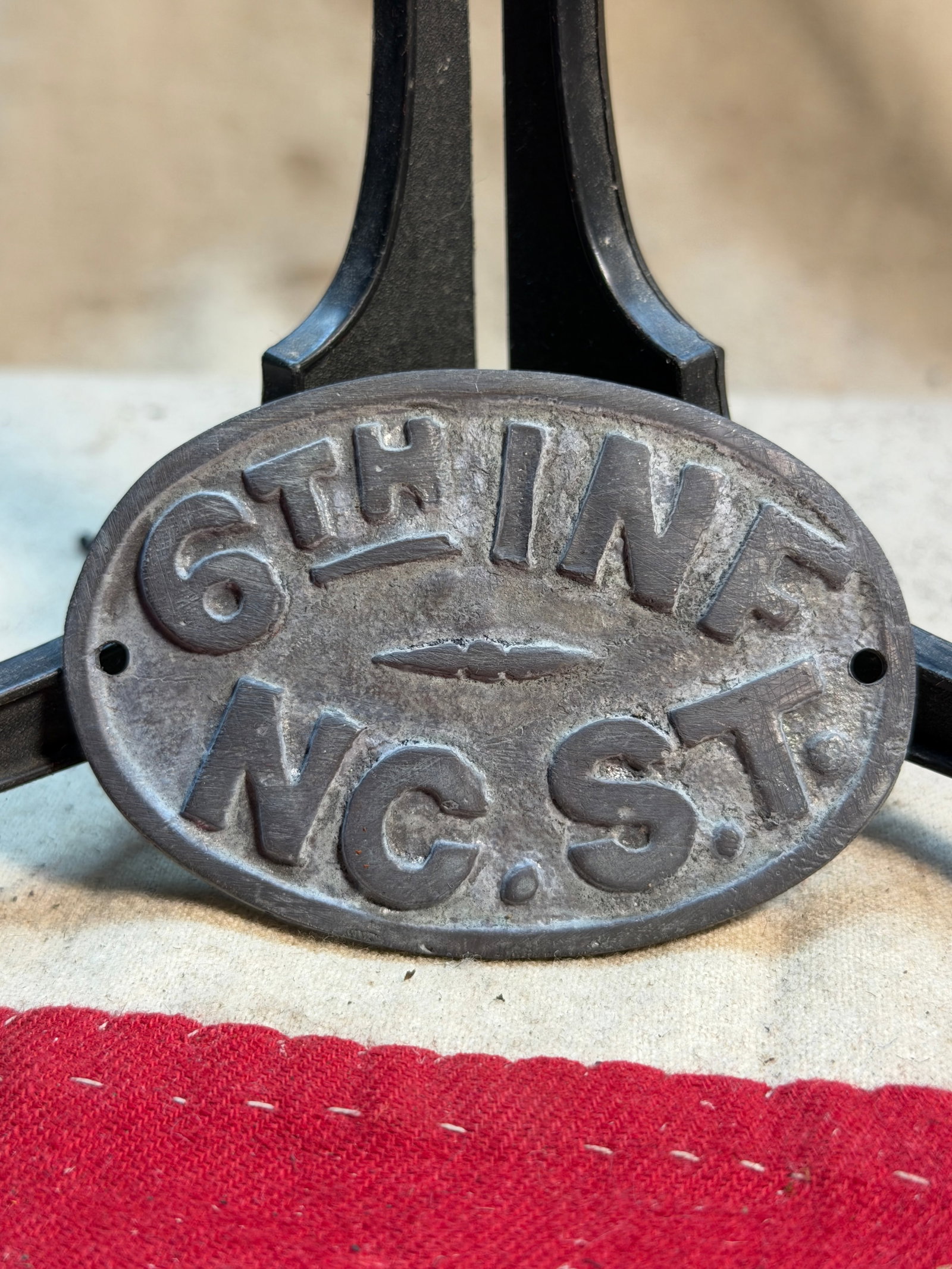 Civil War Confederate North Carolina 6th Infantry Identification Plate: This cast metal identification plate is attributed to the 6th North Carolina State Troops (C.S.A.), a Confederate infantry regiment active throughout the American Civil War. The obverse displays raise