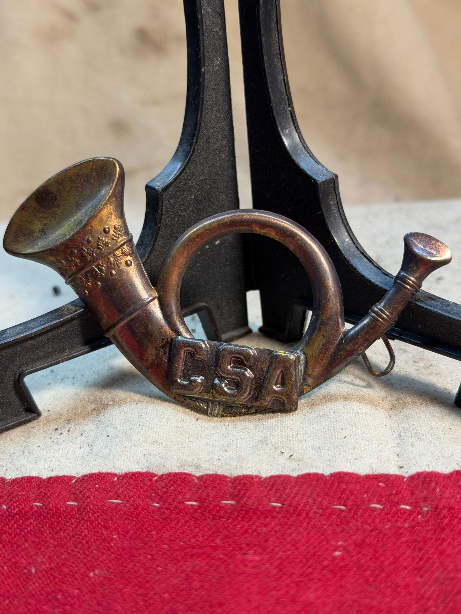 Civil War Confederate CSA Infantry Headgear Badge: This brass CSA Infantry headgear badge is an iconic example of Confederate insignia worn on the caps and slouch hats of Southern infantrymen during the American Civil War (1861–1865). Cast in the fo