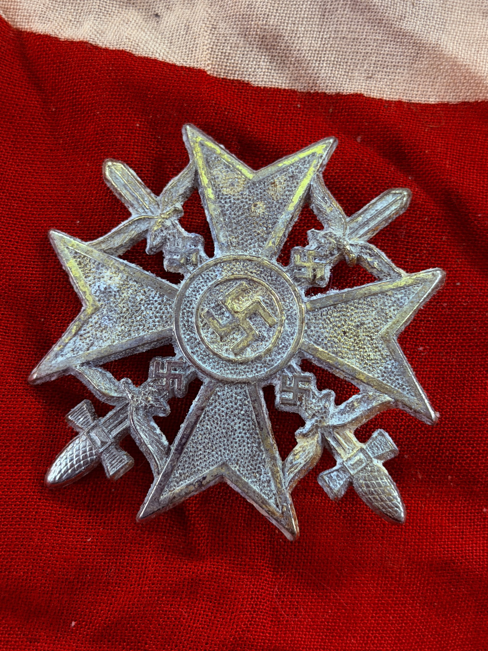 WW2 German War Merit Cross, First Class with Swords (Kriegsverdienstkreuz I. Klasse mit Schwertern): This decoration is a War Merit Cross, First Class with Swords, instituted by Nazi Germany in 1939 to recognize acts of merit connected to the war effort that did not meet the criteria for frontline co