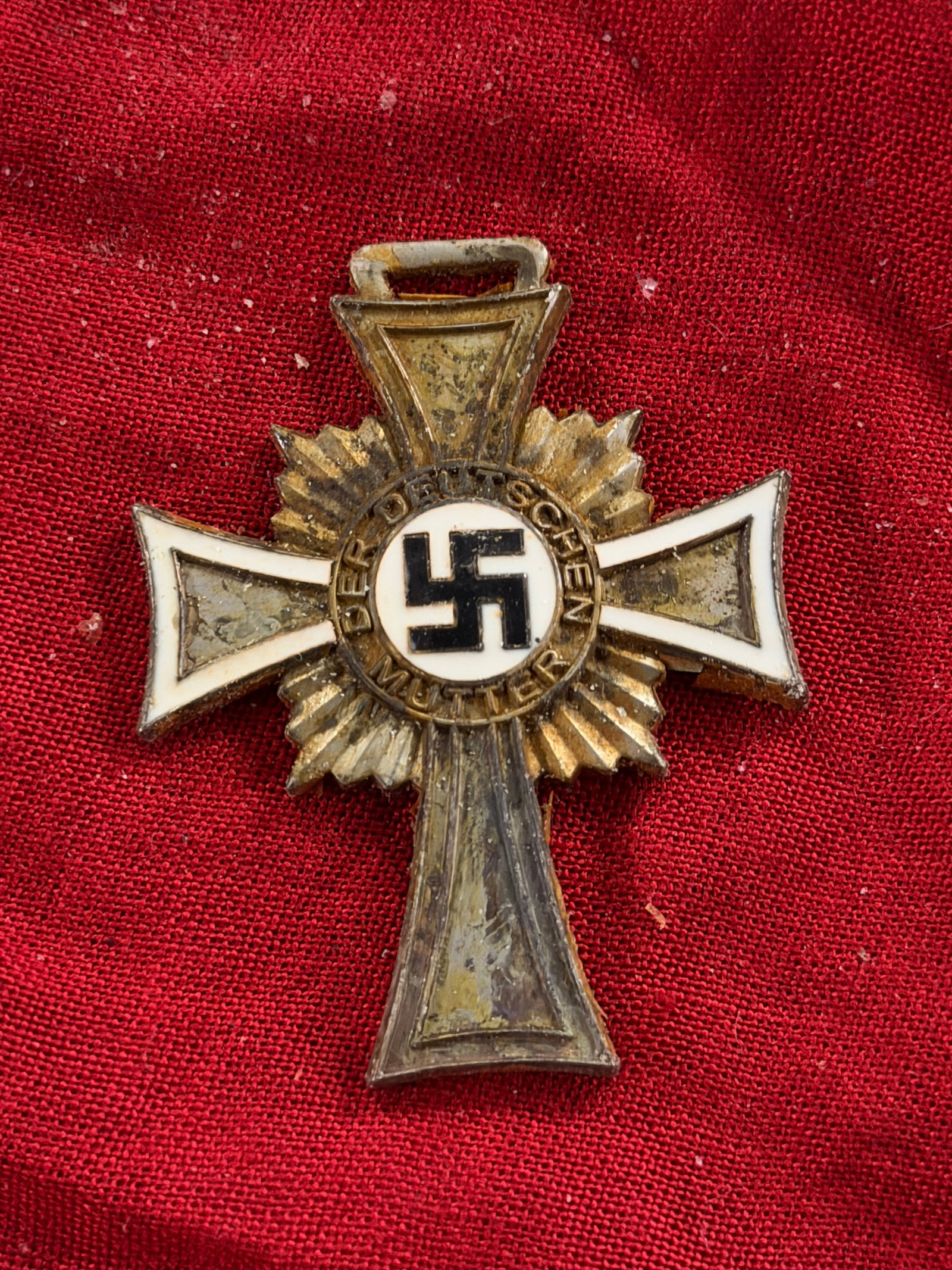 WW2 German Cross of Honor of the German Mother (Mother’s Cross), Third Reich: Cross of Honor of the German Mother (Ehrenkreuz der Deutschen Mutter), a state decoration instituted in 1938 by Nazi Germany. The award was presented to women who bore and raised multiple children, re
