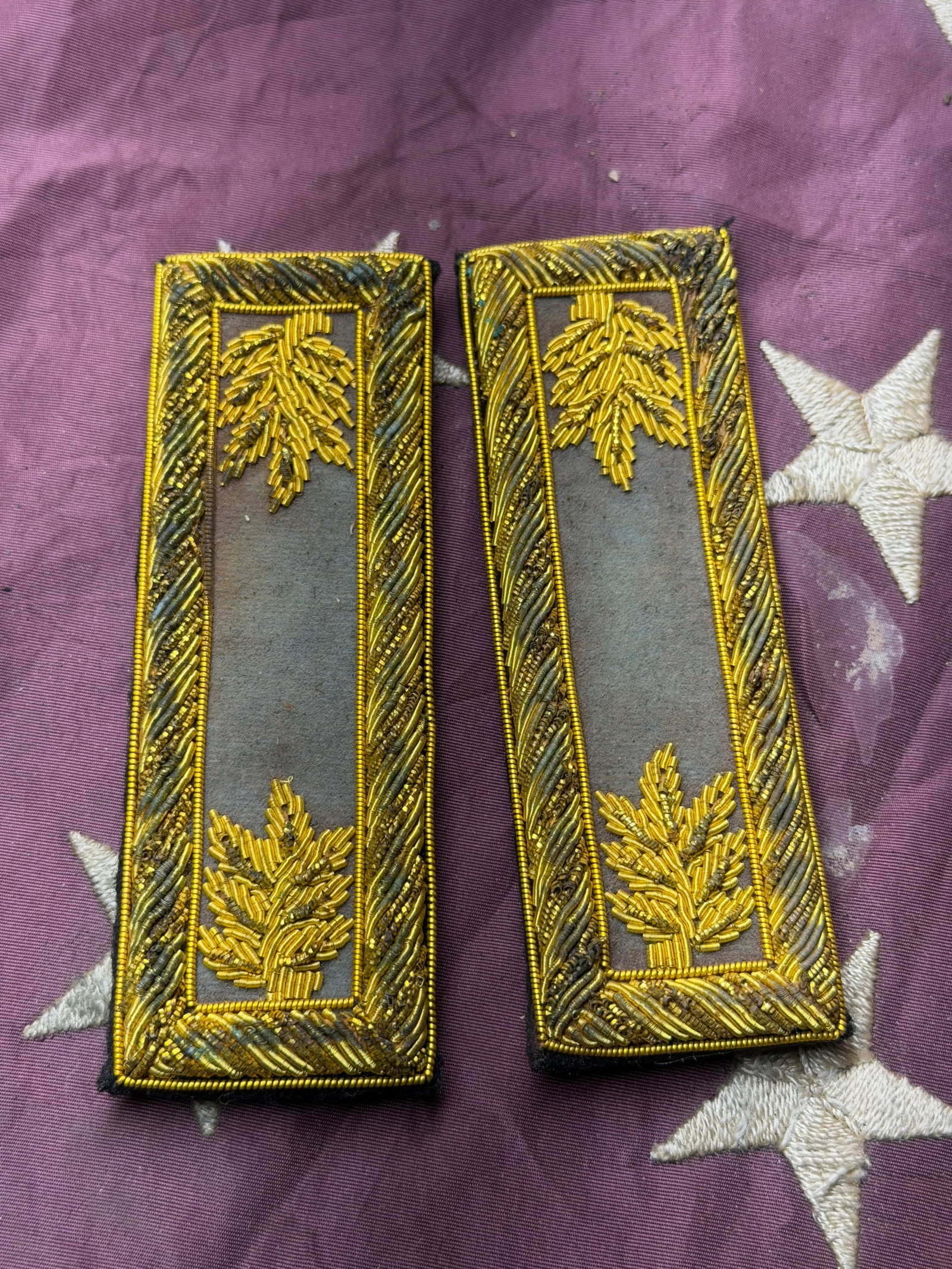 Civil War Pair of Gold-Embroidered Military Shoulder Boards (Epaulettes): This matched pair of rectangular shoulder boards features dense gold bullion embroidery on a dark wool backing, bordered by twisted metallic cord. Each board is decorated with stylized leaf motifs exe