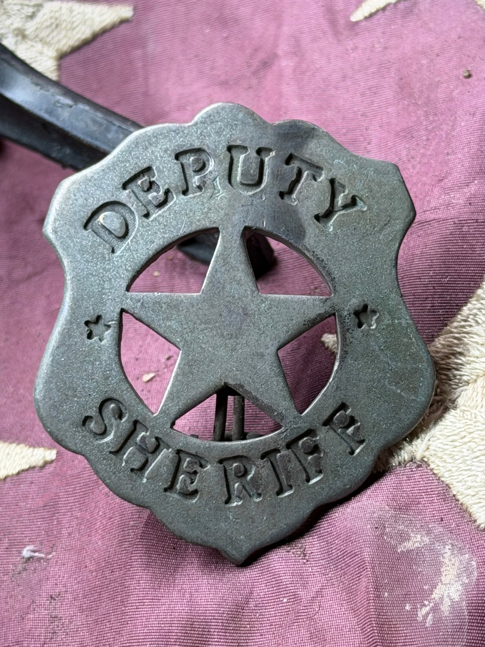 Deputy Sheriff’s Star Badg: This metal Deputy Sheriff’s badge dates to the late 19th or early 20th century and reflects the standardized insignia adopted by local law enforcement agencies across the United States during this p