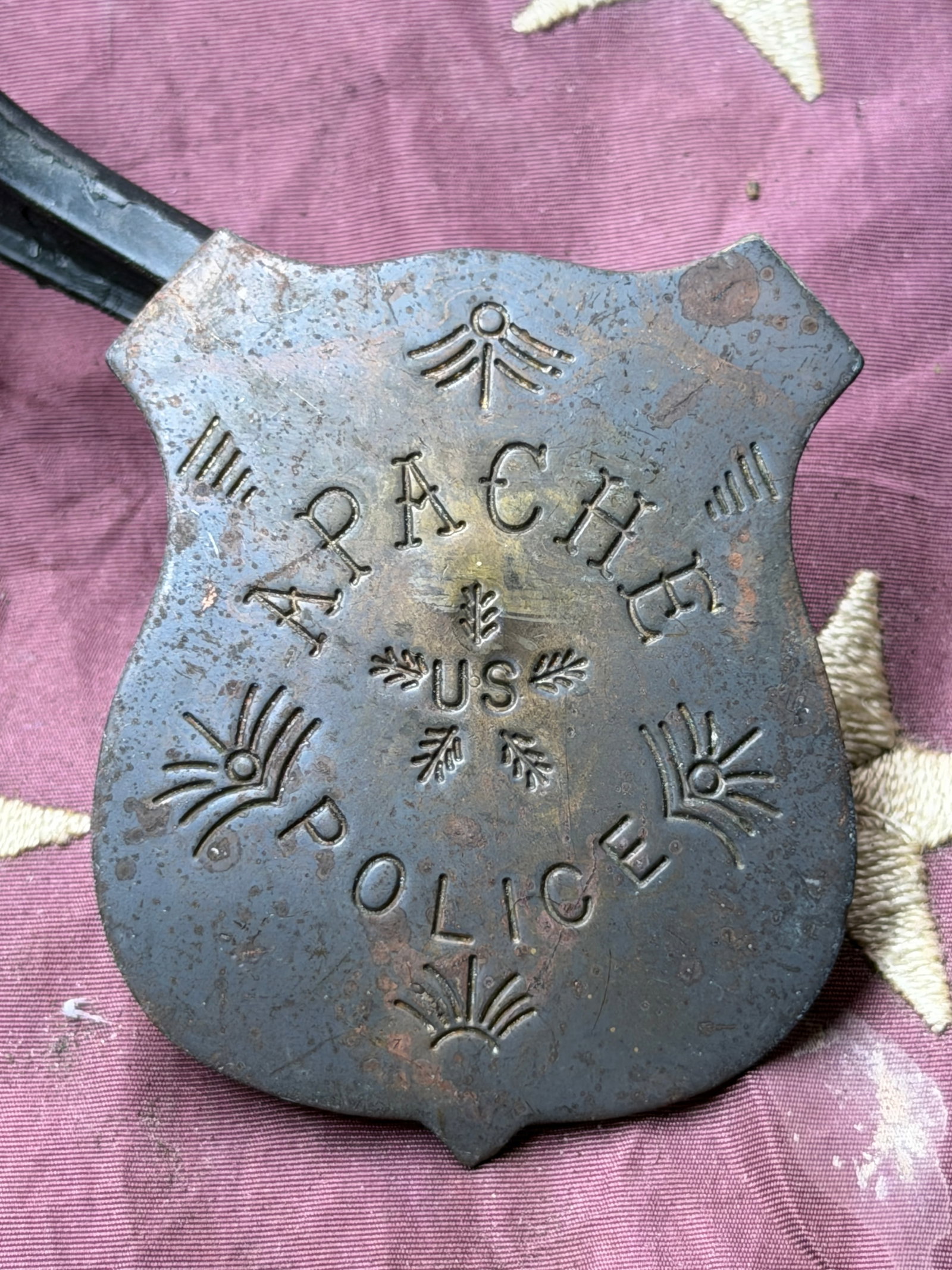 Apache Police Badge, United States Indian Police, Late 19th Century: This metal Apache Police badge dates to the late 19th century and is associated with the United States Indian Police, a federal law enforcement body established to maintain order on Native American re