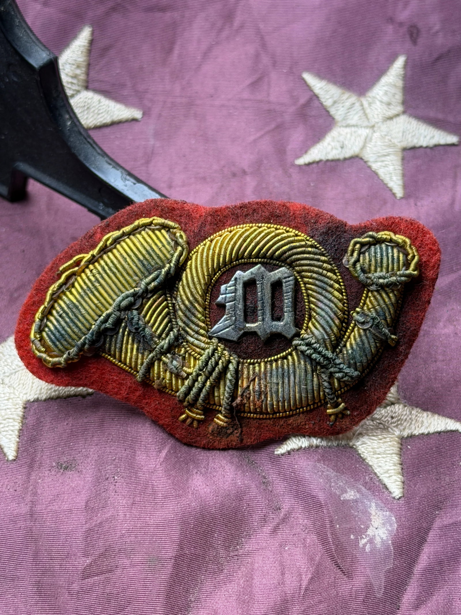 Civil War–Era U.S. Marine Corps Officer’s Hat Insignia By Schuyler Hartley & Graham: This U.S. Marine Corps officer’s hat insignia dates to the Civil War period and features a bullion-embroidered bugle enclosing the letter “M,” the traditional emblem of the United States Mar