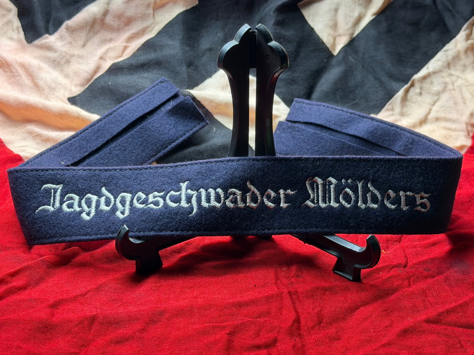 WW2 German Luftwaffe Cuff Title “Jagdgeschwader Mölders?? – Fighter Wing Sleeve Band: World War II–era German Luftwaffe cuff title bearing the embroidered inscription “Jagdgeschwader Mölders”, referring to the Luftwaffe fighter wing named in honor of Werner Mölders, a promi