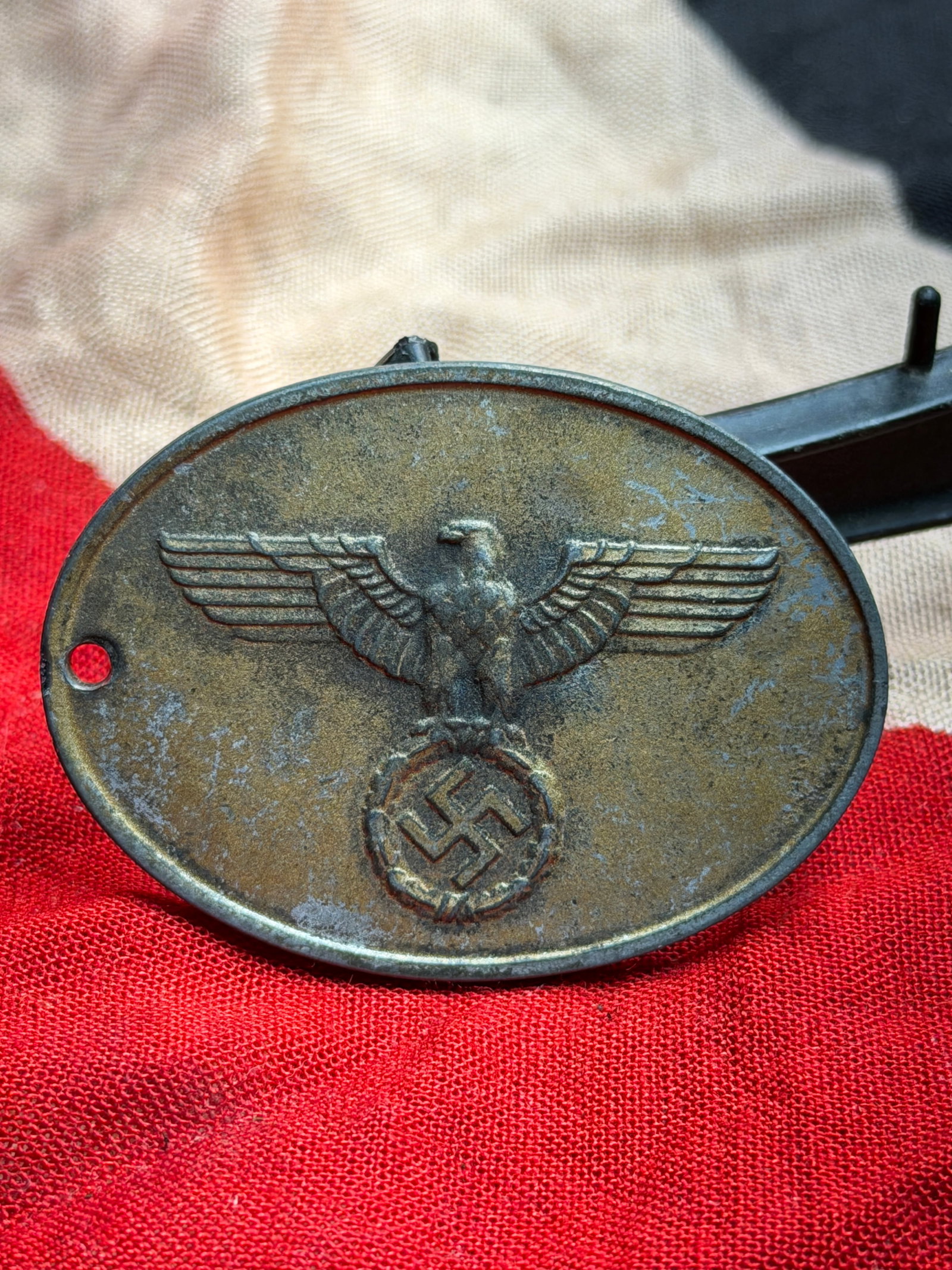 WW2 German Identification Badge of the State Criminal Police (Staatliche Kriminalpolizei), Nazi: This oval metal identification badge belonged to a member of the Staatliche Kriminalpolizei (Kripo), the State Criminal Police of Nazi Germany. The Kripo was a central component of the German law-enfo