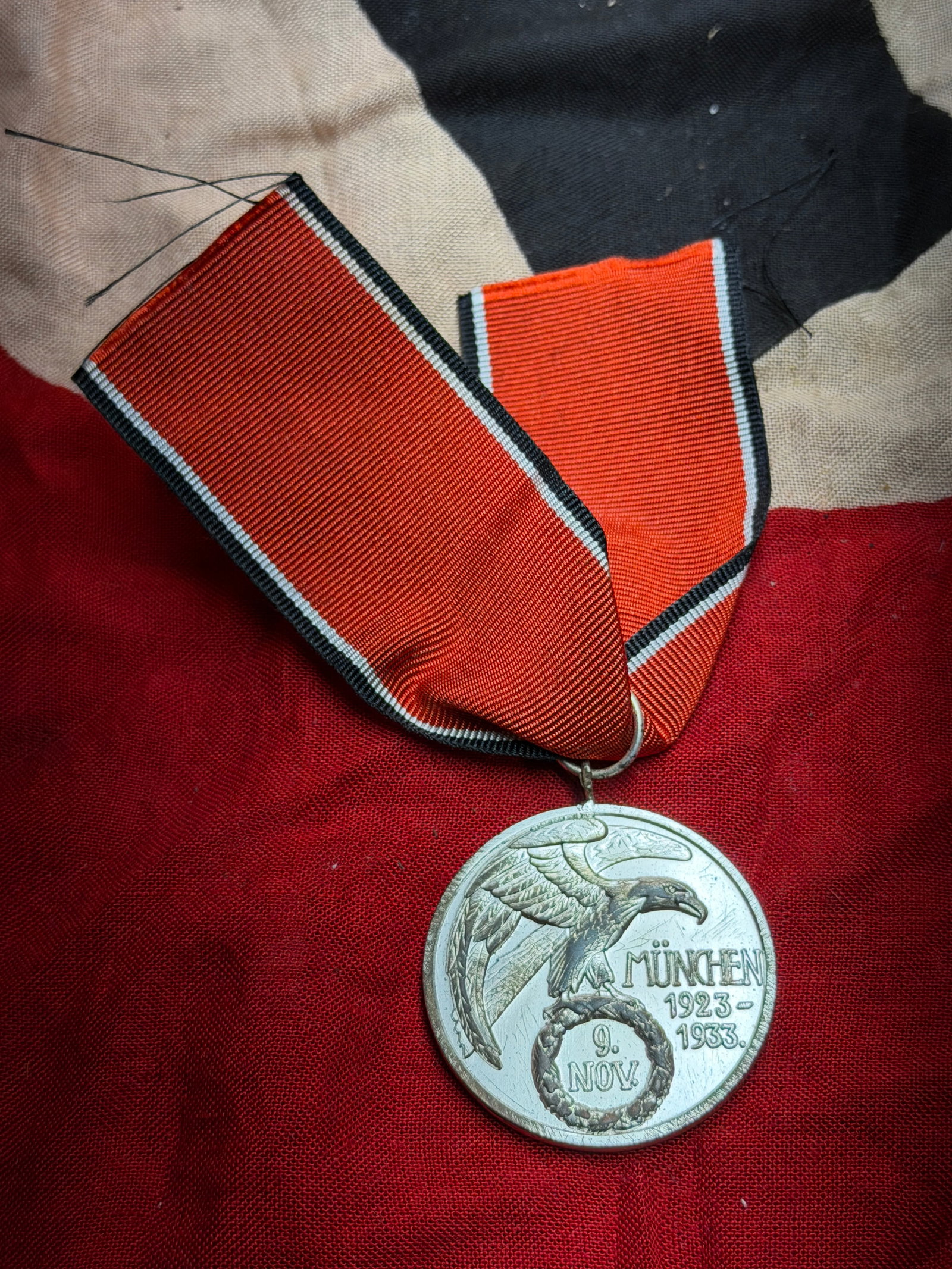 WW2 German National Socialist “Blood Order?? Medal (Blutorden: This medal is identified as the Blutorden (“Blood Order”), one of the most significant and symbolically charged decorations awarded by the National Socialist movement in Germany. Instituted in