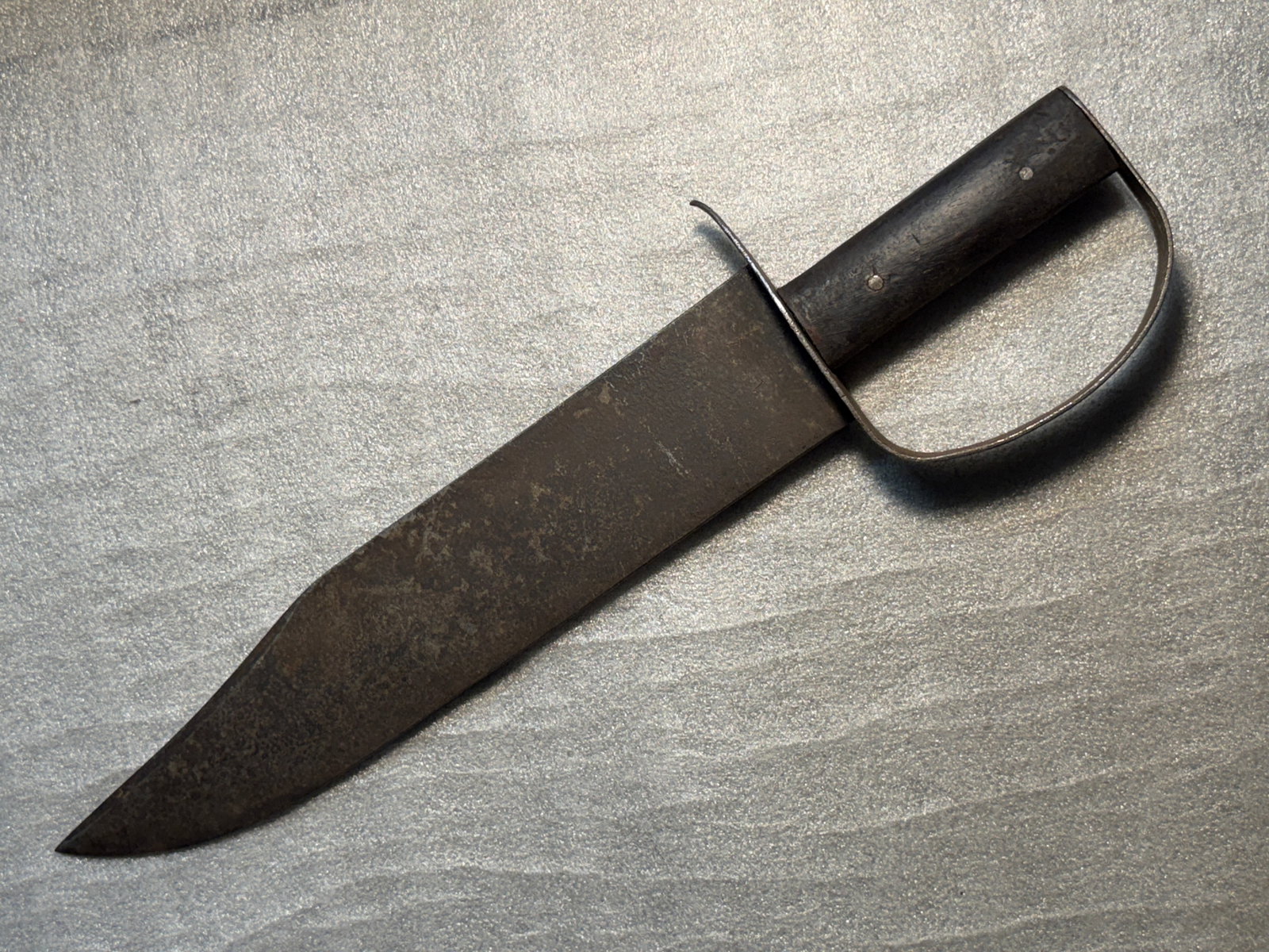 Civil War Confederate D-Guard Bowie Knife, Marked “1861 C.S.A.: This large D-guard Bowie knife dates to the opening year of the American Civil War and is marked “1861 C.S.A.,” identifying it with the Confederate States of America. Characterized by its long