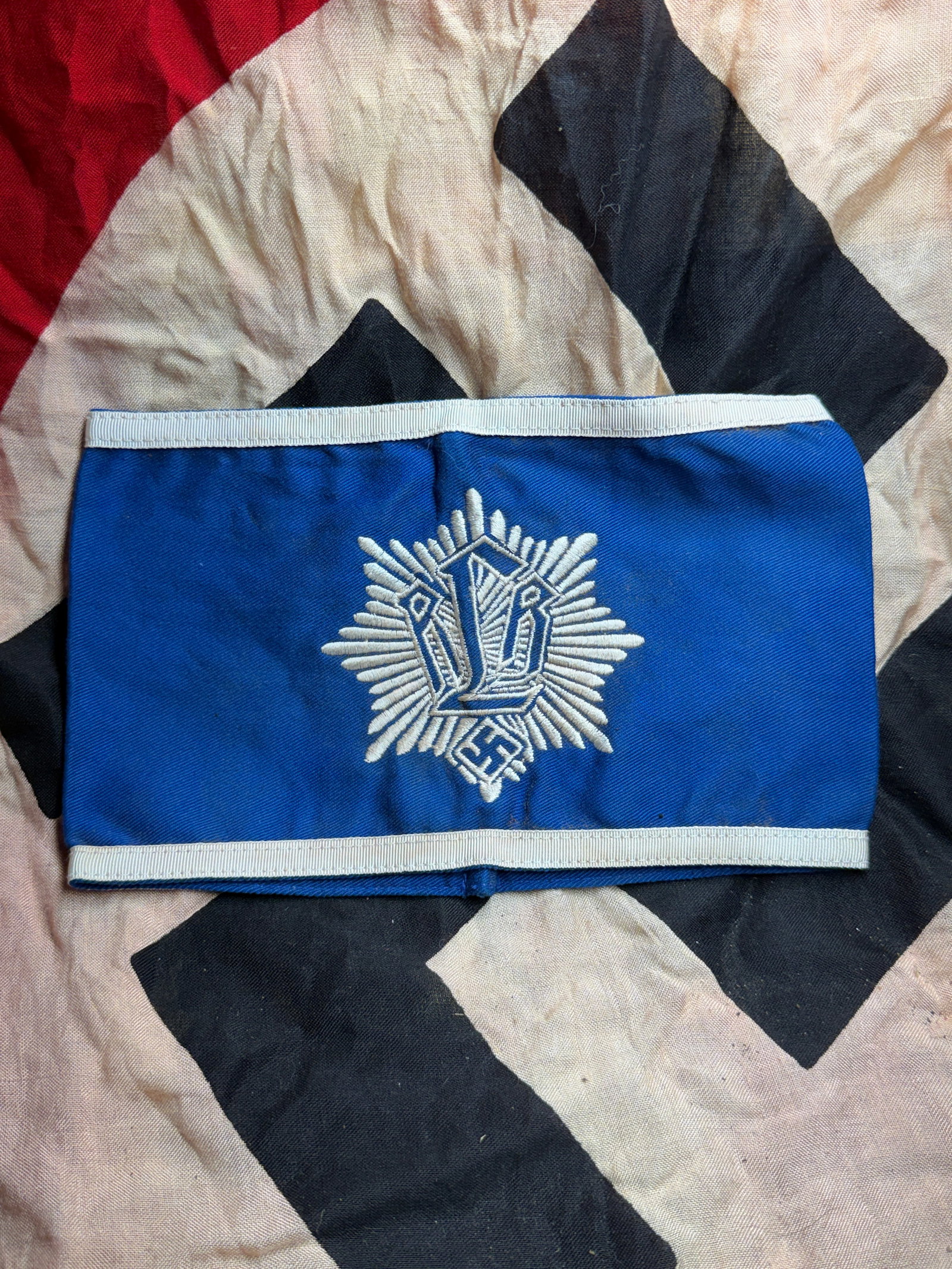 WW2 German Reichsluftschutzbund (RLB) Armband, Nazi Germany: This blue cloth armband is an original insignia associated with the Reichsluftschutzbund (RLB), or Reich Air Protection League, a paramilitary civil defense organization in Nazi Germany active from th