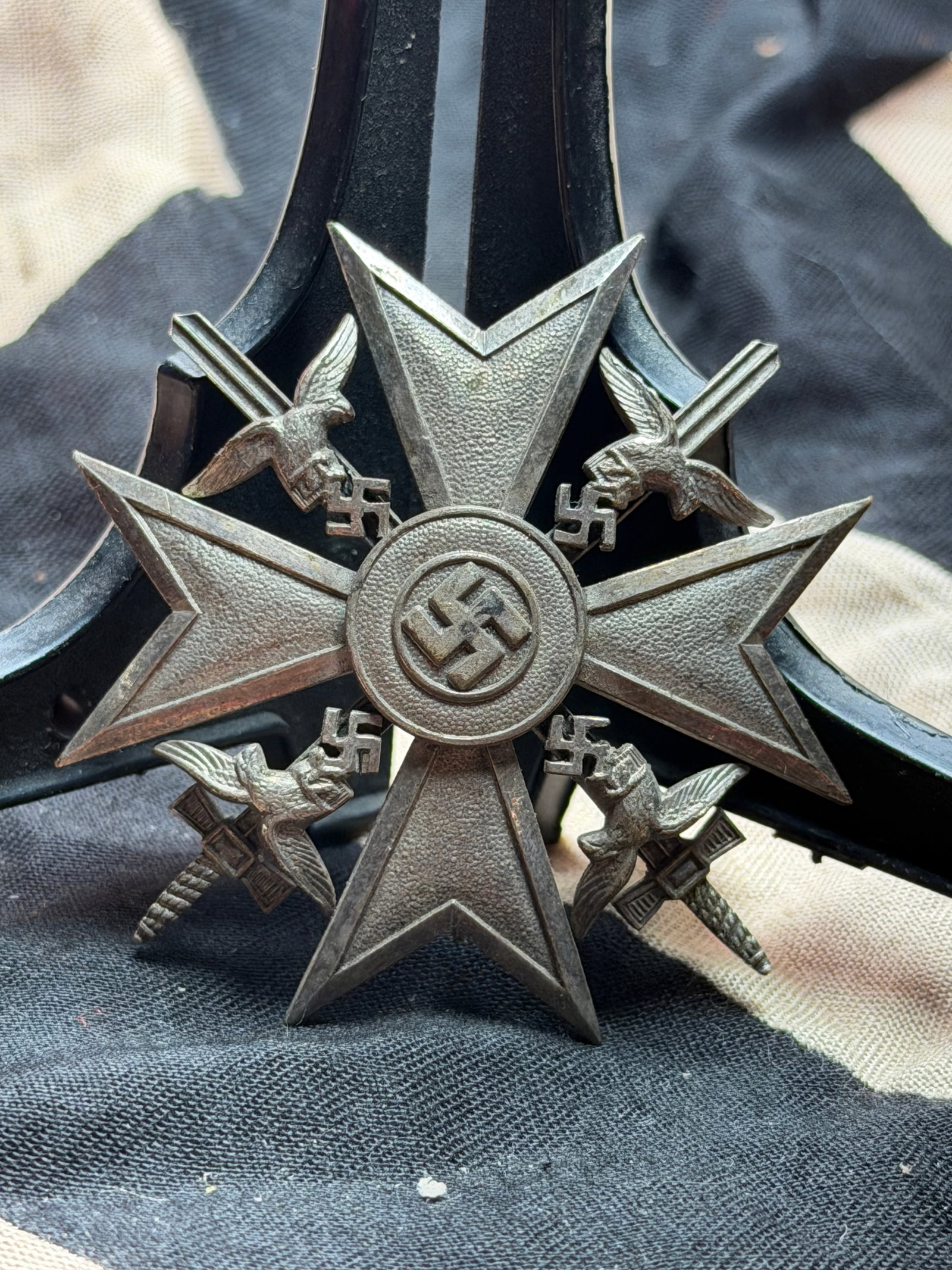 War Merit Cross with Swords (Kriegsverdienstkreuz mit Schwertern), Third Reich WW2 Germany: This object is a German War Merit Cross with Swords, a military decoration instituted in 1939 during the Second World War. Unlike the Iron Cross, which was awarded for direct battlefield bravery, the 