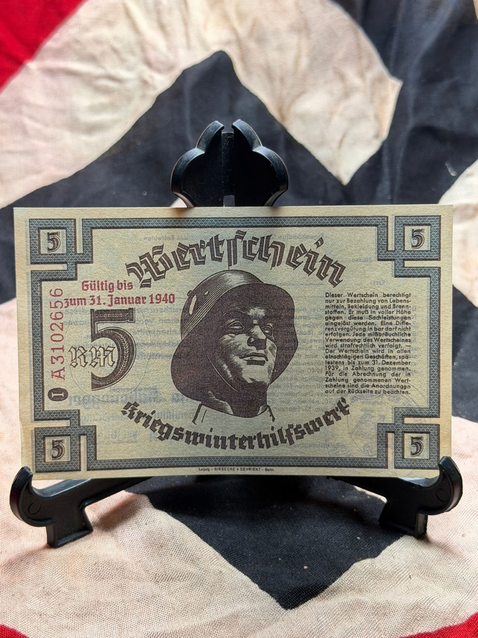 WW2 German Winter Relief Organization (Winterhilfswerk) Ration Voucher, 5 Reichsmark: This paper voucher was issued by the Winter Relief Organization (Winterhilfswerk des Deutschen Volkes, WHW), a state-sponsored social welfare program of Nazi Germany. Denominated at 5 Reichsmark, the