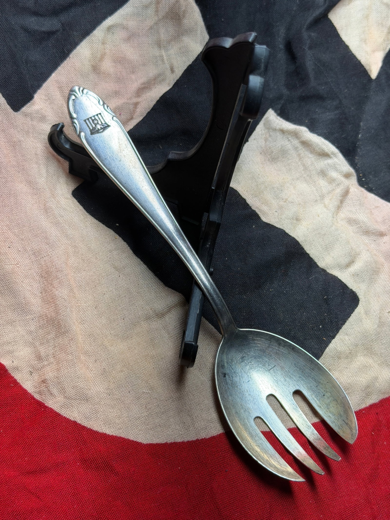 WW2 German State-Issued Serving Spoon BMF 90 (Reichskanzlei Motif), Nazi: This metal serving spoon is an example of state-issued or officially sanctioned tableware produced in Nazi Germany during the late 1930s and Second World War. The handle bears a stamped image of the R