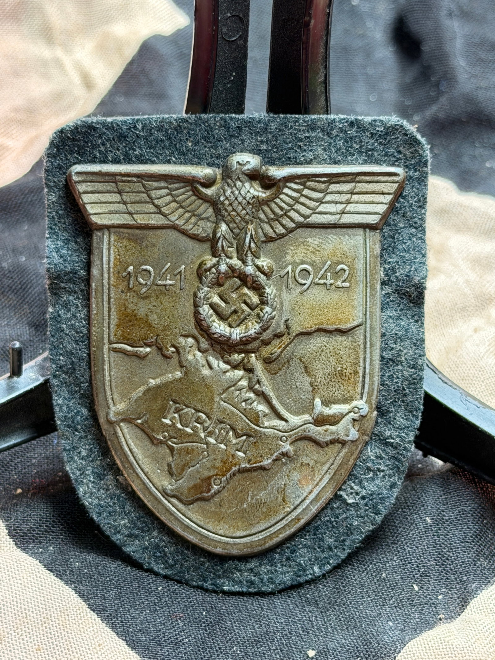WW2 German Crimea Campaign Shield (Krimschild), Nazi: This metal campaign shield, known as the Krimschild (Crimea Shield), was instituted by Nazi Germany in July 1942 and awarded to members of the German armed forces who participated in the Crimean Campa