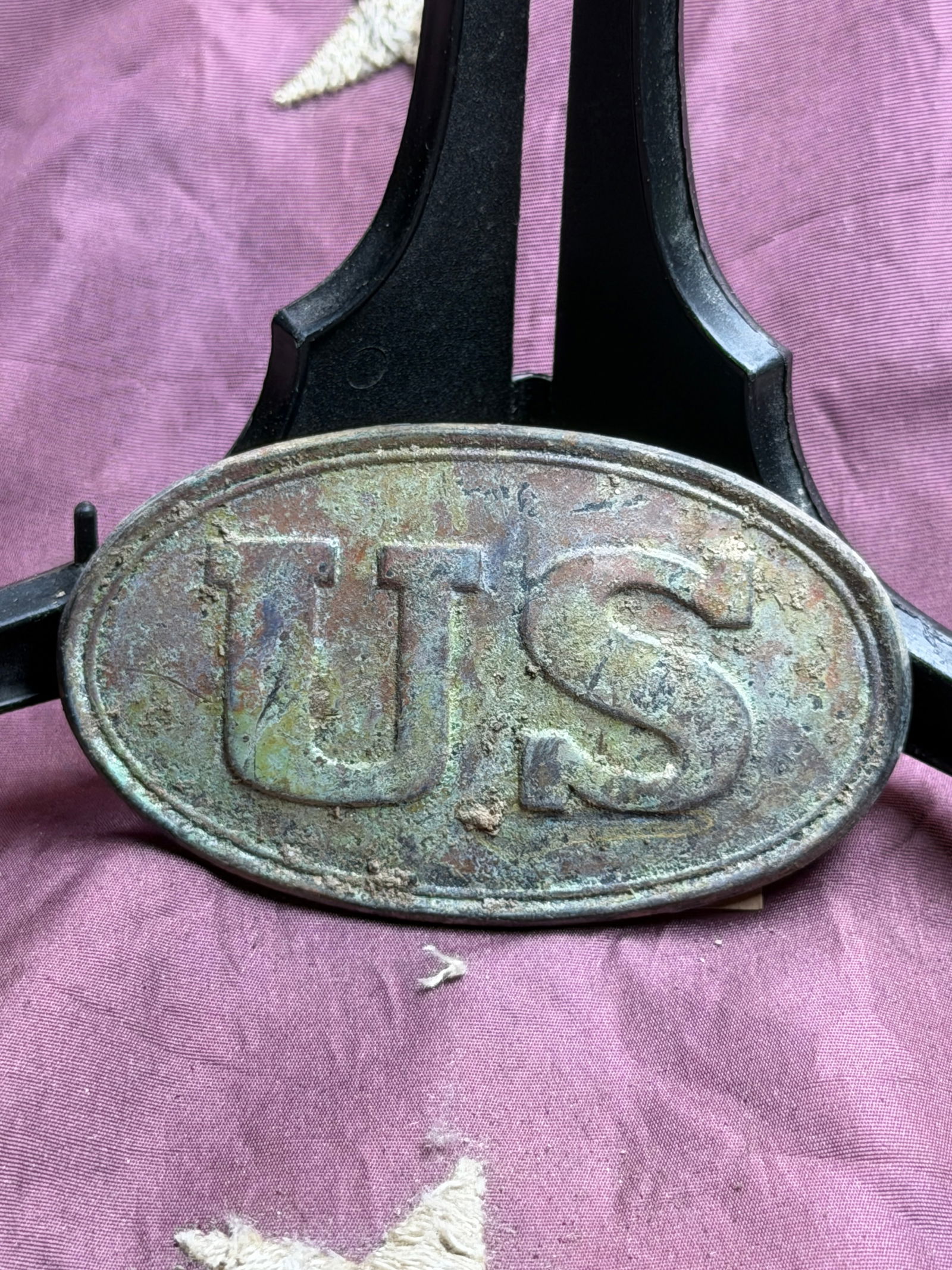 Civil War United States Infantry Belt Plate Excavated Bull Run, VA: This oval brass belt plate bears the raised letters “US,” identifying it as a standard United States Army enlisted man’s waist belt plate used during the American Civil War (1861–1865). Wo
