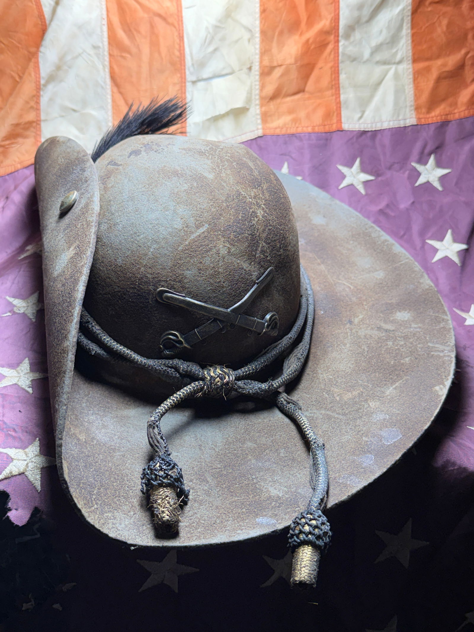 Civil War Confederate Cavalry Slouch Hat Cap Kepi: This well-worn Civil War–era slouch hat exemplifies the practical yet symbolic headgear favored by officers and mounted troops during the American Civil War (1861–1865). Constructed of felt with a