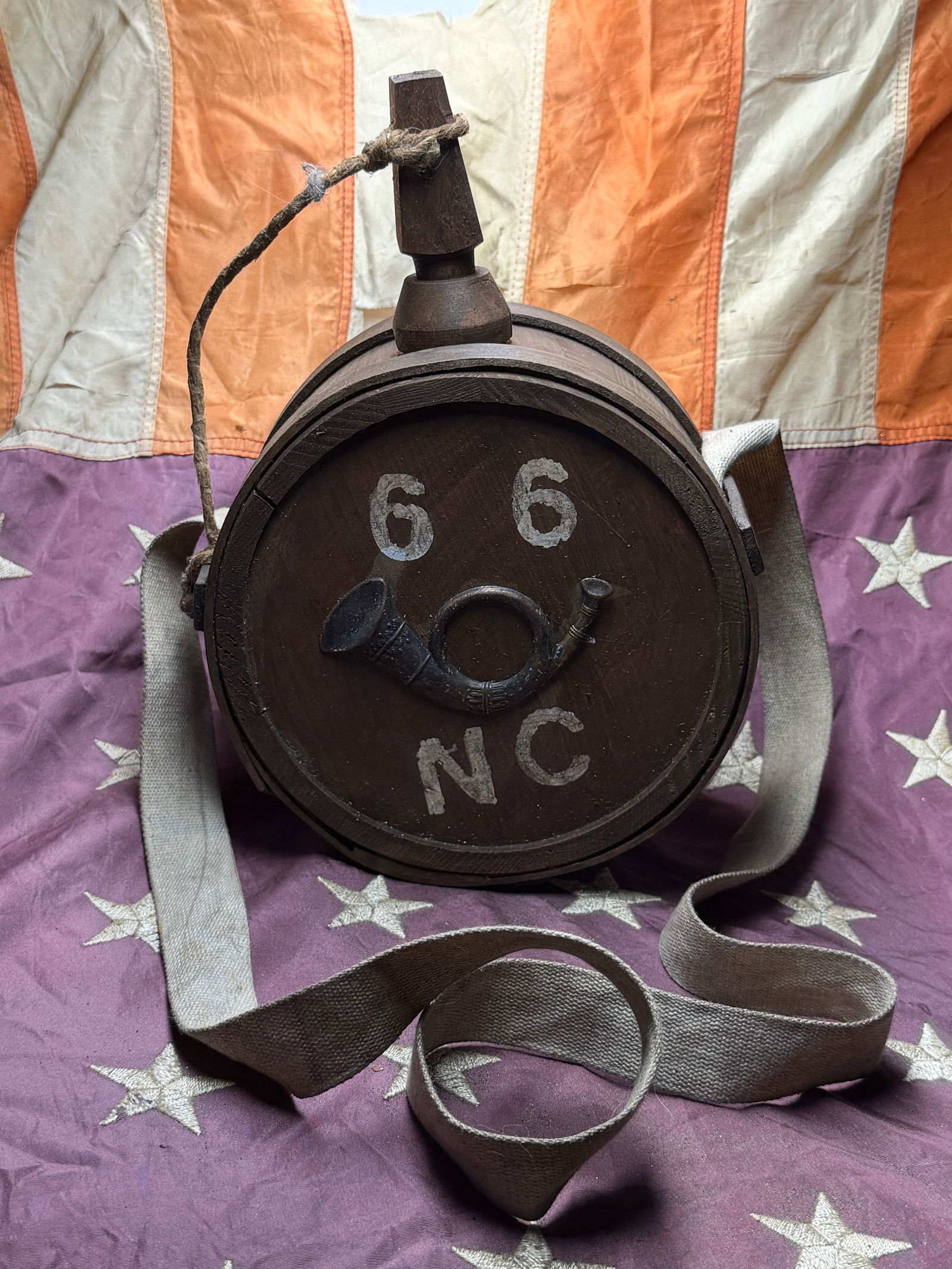 Civil War Confederate Soldier’s Drum Canteen: This rare Civil War–era Confederate drum canteen exemplifies the ingenuity and material scarcity faced by Southern forces during the American Civil War (1861–1865). The canteen is designed in a di