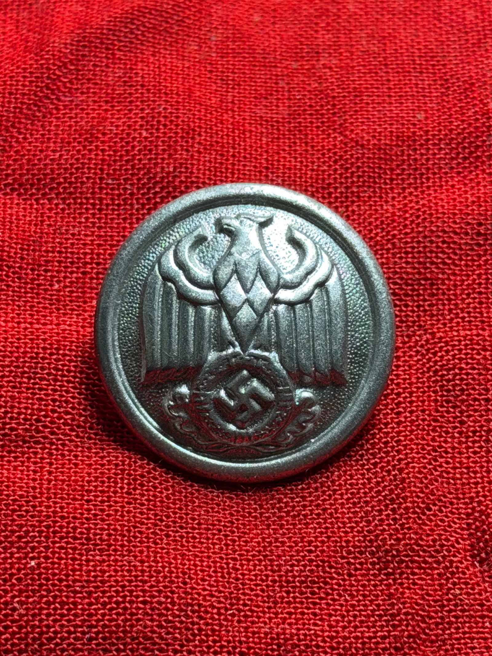WW2 German Diplomatic Service Uniform Button: This metal uniform button was worn by members of the German Diplomatic Service (Auswärtiges Amt) during the Second World War. The obverse features the Reichsadler—the national eagle of Germany—gr