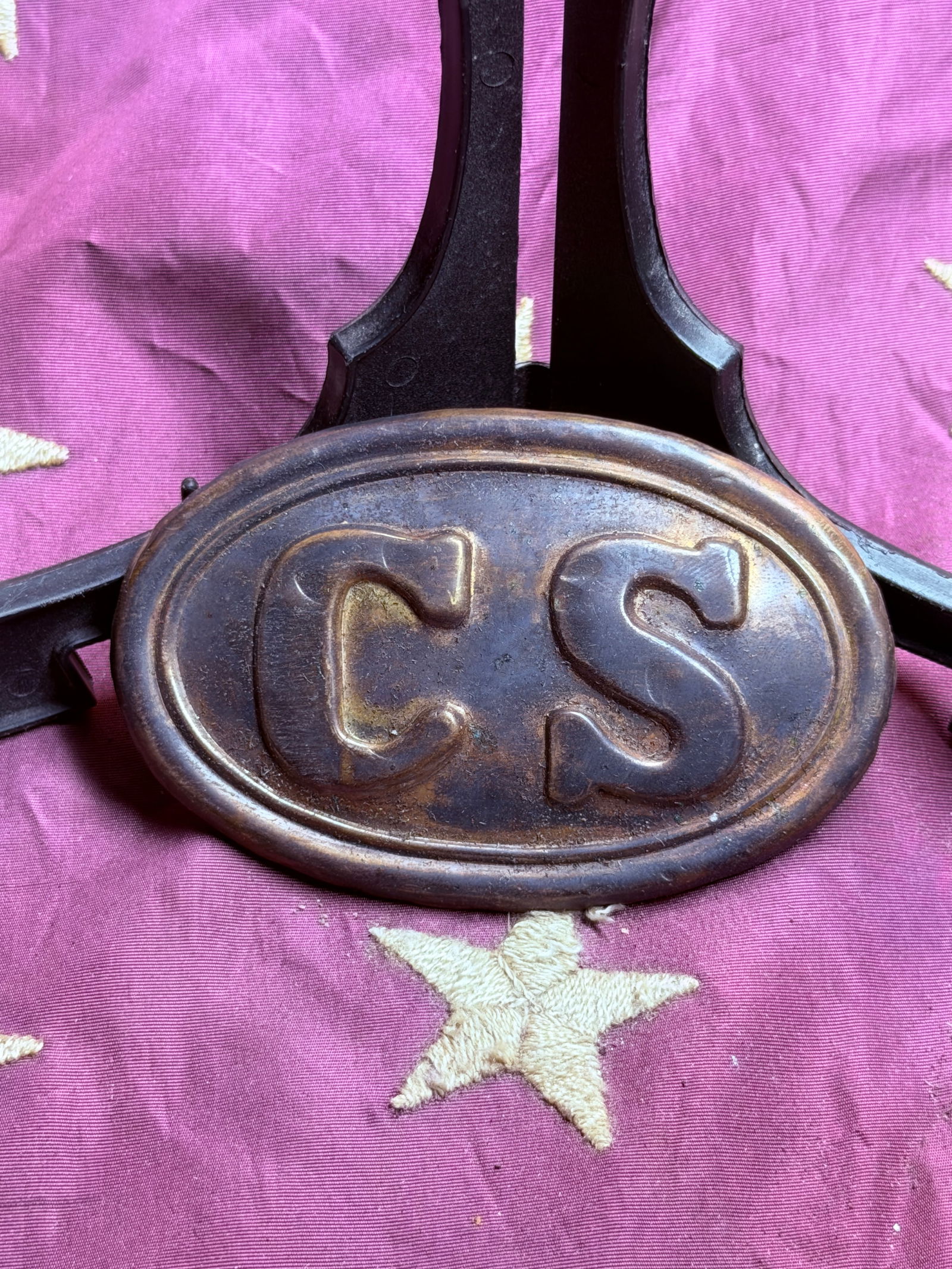 Civil War Confederate States “CS?? Oval Belt Plate: This oval brass belt plate bears the raised initials “CS”, denoting the Confederate States, and was worn by soldiers of the Confederate Army during the American Civil War (1861–1865). Such p