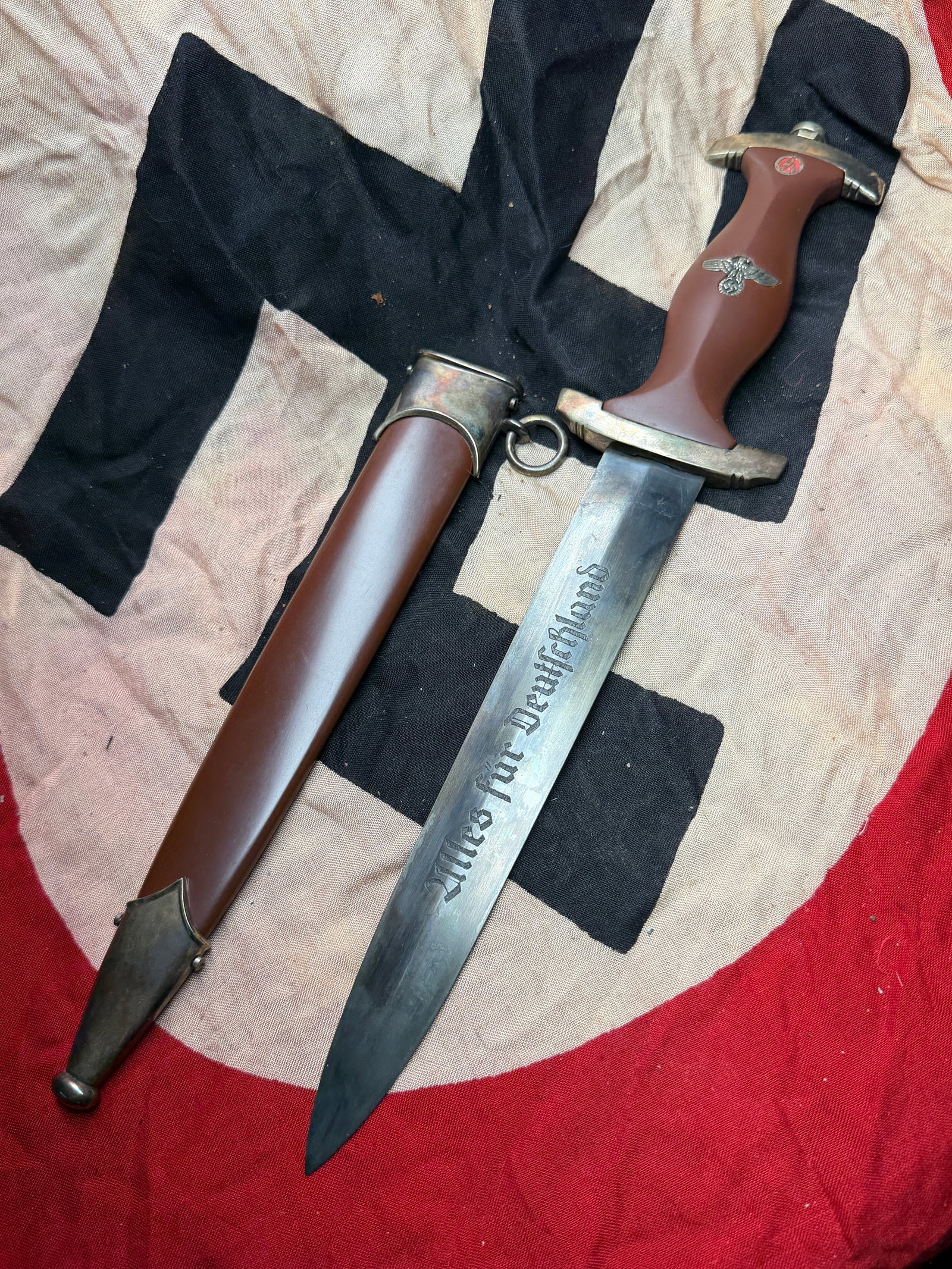 WW2 German World War II German SA (Sturmabteilung) Service Dagger: This object is a German SA (Sturmabteilung) Service Dagger, a ceremonial edged weapon worn by members of the Nazi Party’s paramilitary organization during the early years of the Third Reich and into