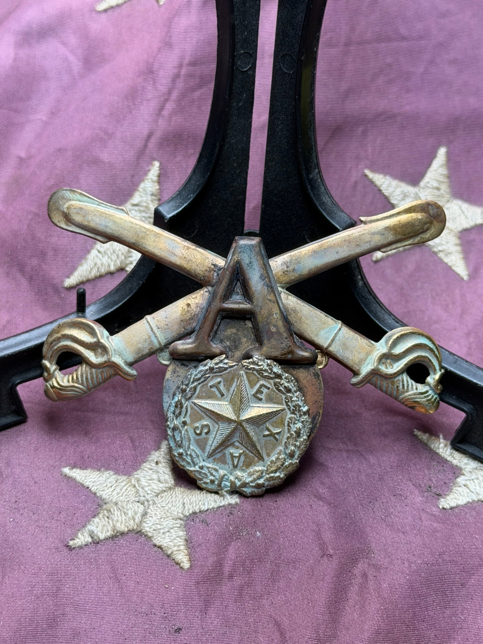 Civil War Confederate Artillery Insignia, Texas State Troops: This metal insignia represents Confederate artillery service associated with Texas during the American Civil War (1861–1865). The design features crossed cannons—an established symbol of artillery