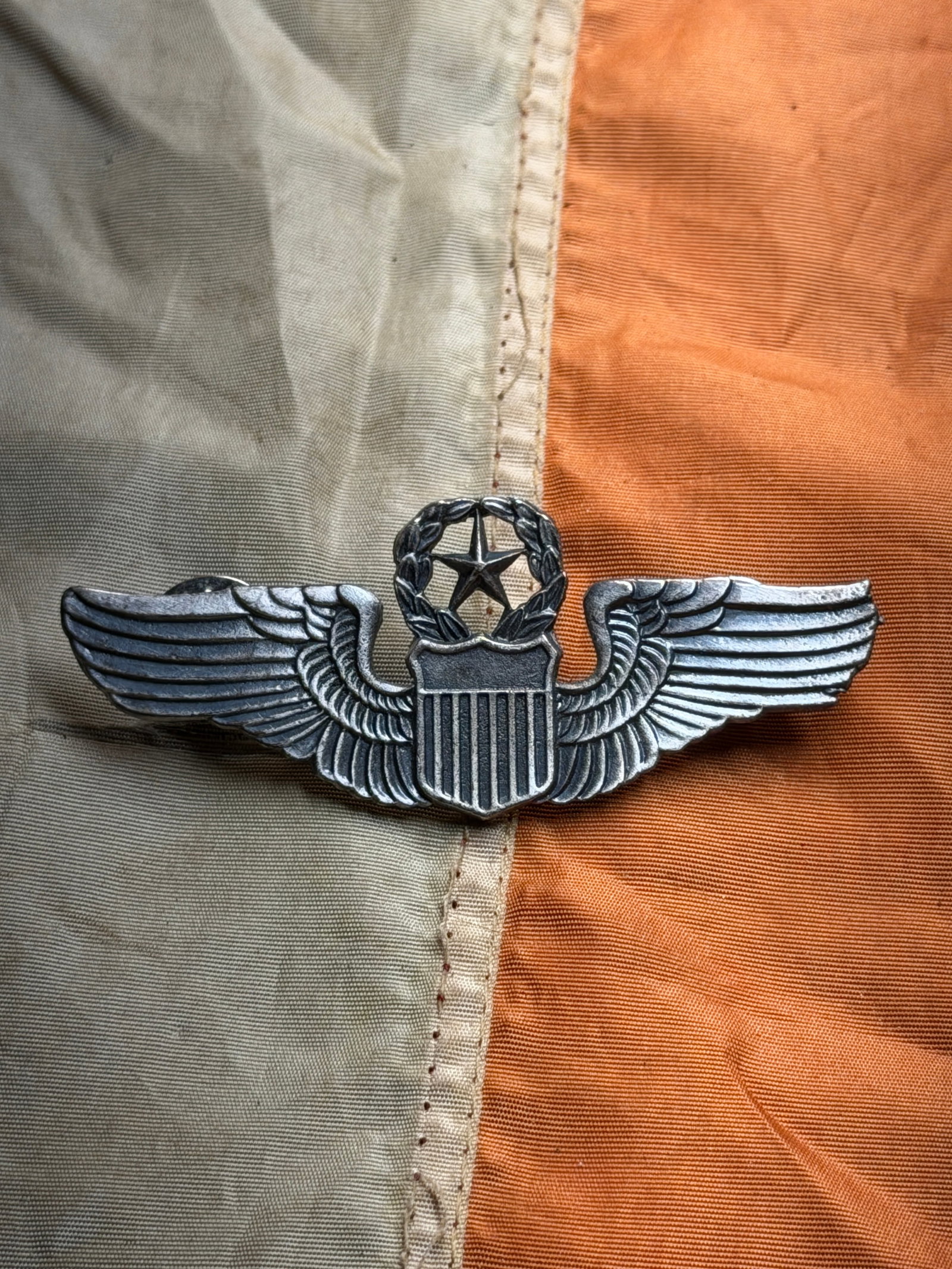 Civil War United States Air Force Command Pilot Wings Insignia: This metal insignia is a United States Air Force Command Pilot Badge, awarded to aviators who attained the highest level of aeronautical qualification in the U.S. Air Force. The badge features outstre