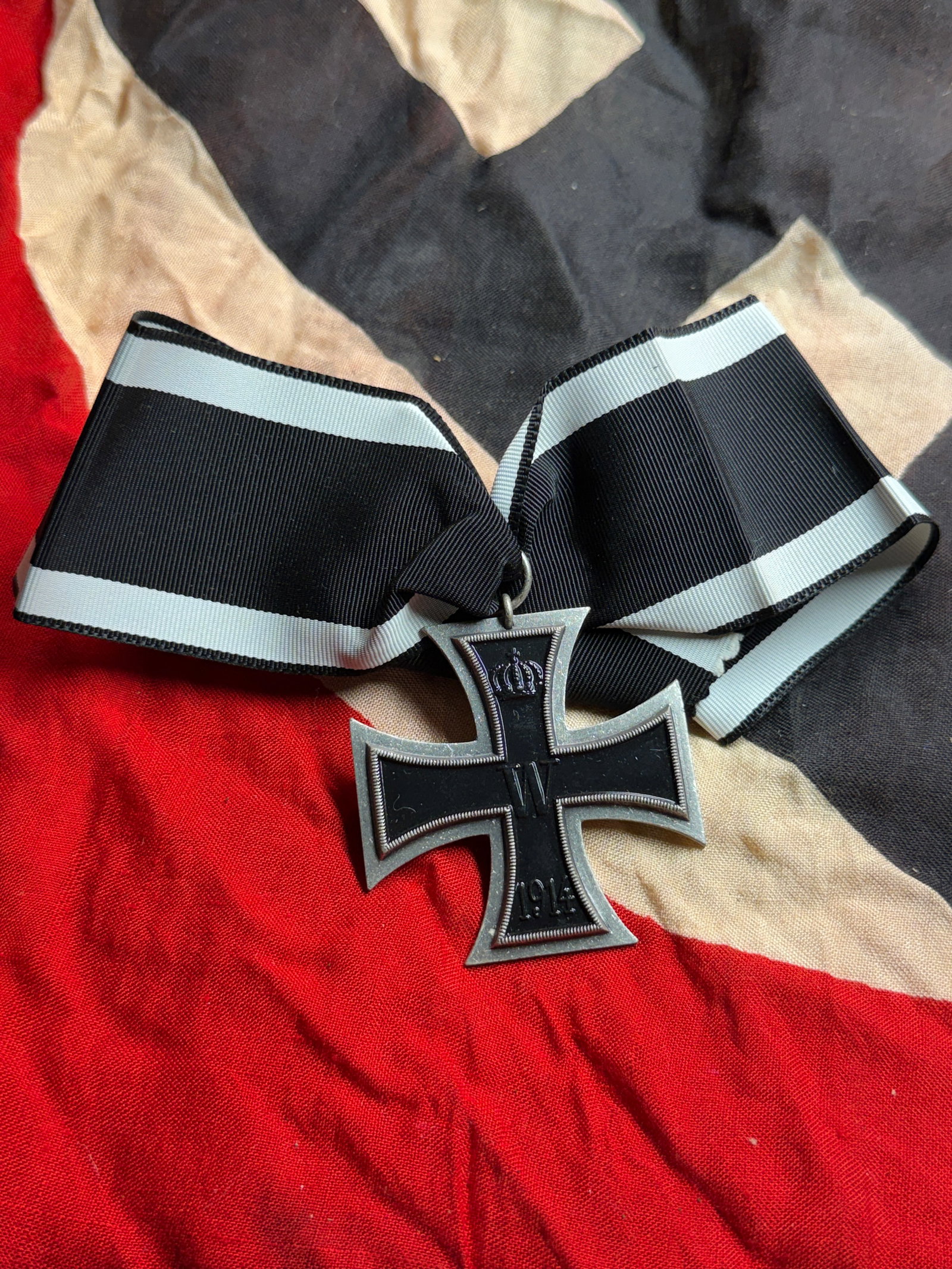 WW2 German Iron Cross, Second Class (Eisernes Kreuz II. Klasse), 1914: This medal is the Iron Cross, Second Class, instituted by Kaiser Wilhelm II of the German Empire on 5 August 1914 at the outbreak of the First World War. The Iron Cross tradition dates back to 1813 an