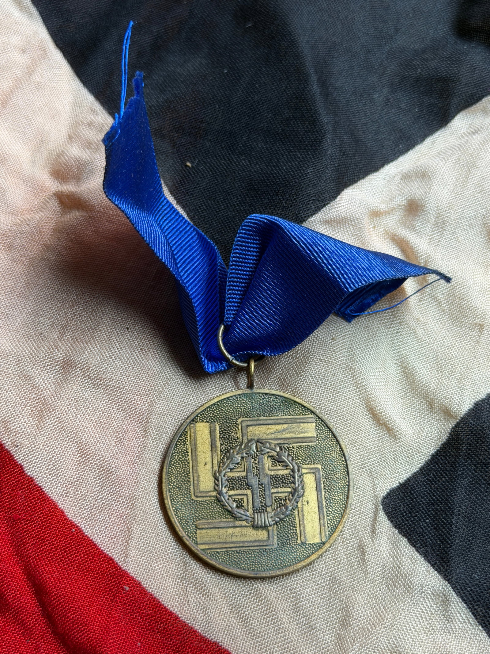 WW2 German SS Long Service Award, 8 Years (SS-Dienstauszeichnung, 3rd Class): This medal is the SS Long Service Award for eight years of service, officially designated the SS-Dienstauszeichnung, 3rd Class. Instituted on 30 January 1938, the award recognized continuous service w