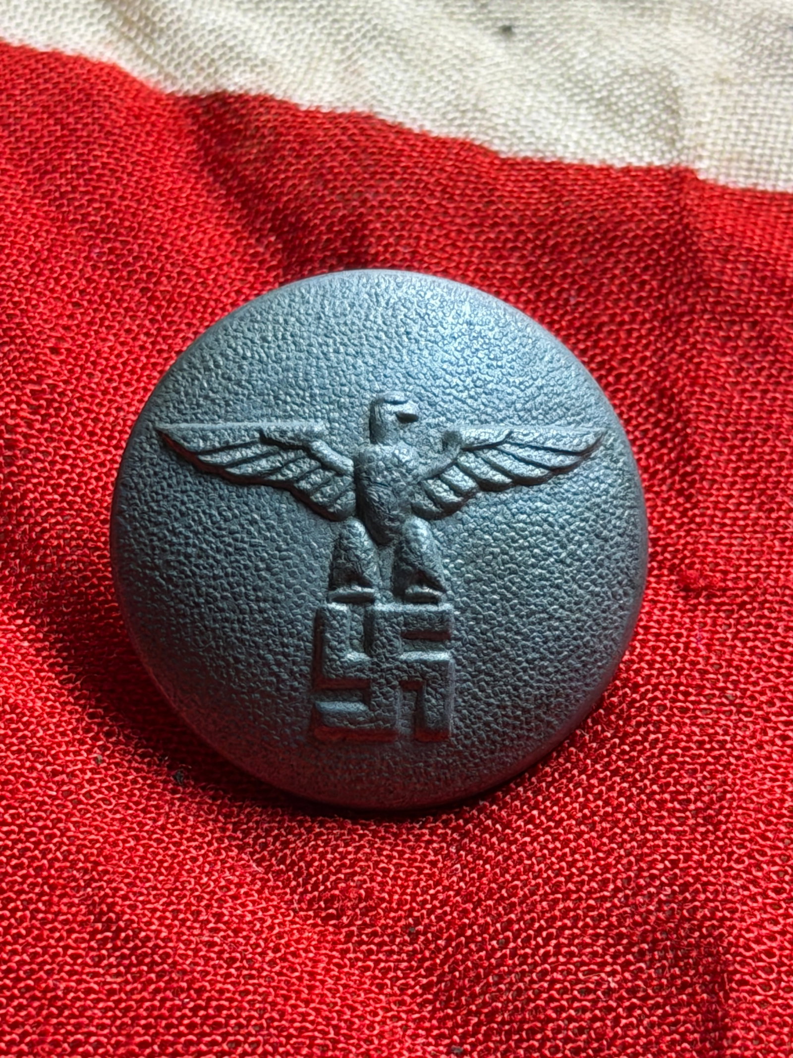 WW2 Political Leader Uniform Button, National Socialist German Workers’ Party (NSDAP): This metal uniform button was produced for wear on the service uniforms of political leaders within the National Socialist German Workers’ Party (NSDAP) during the Third Reich. Circular in form and