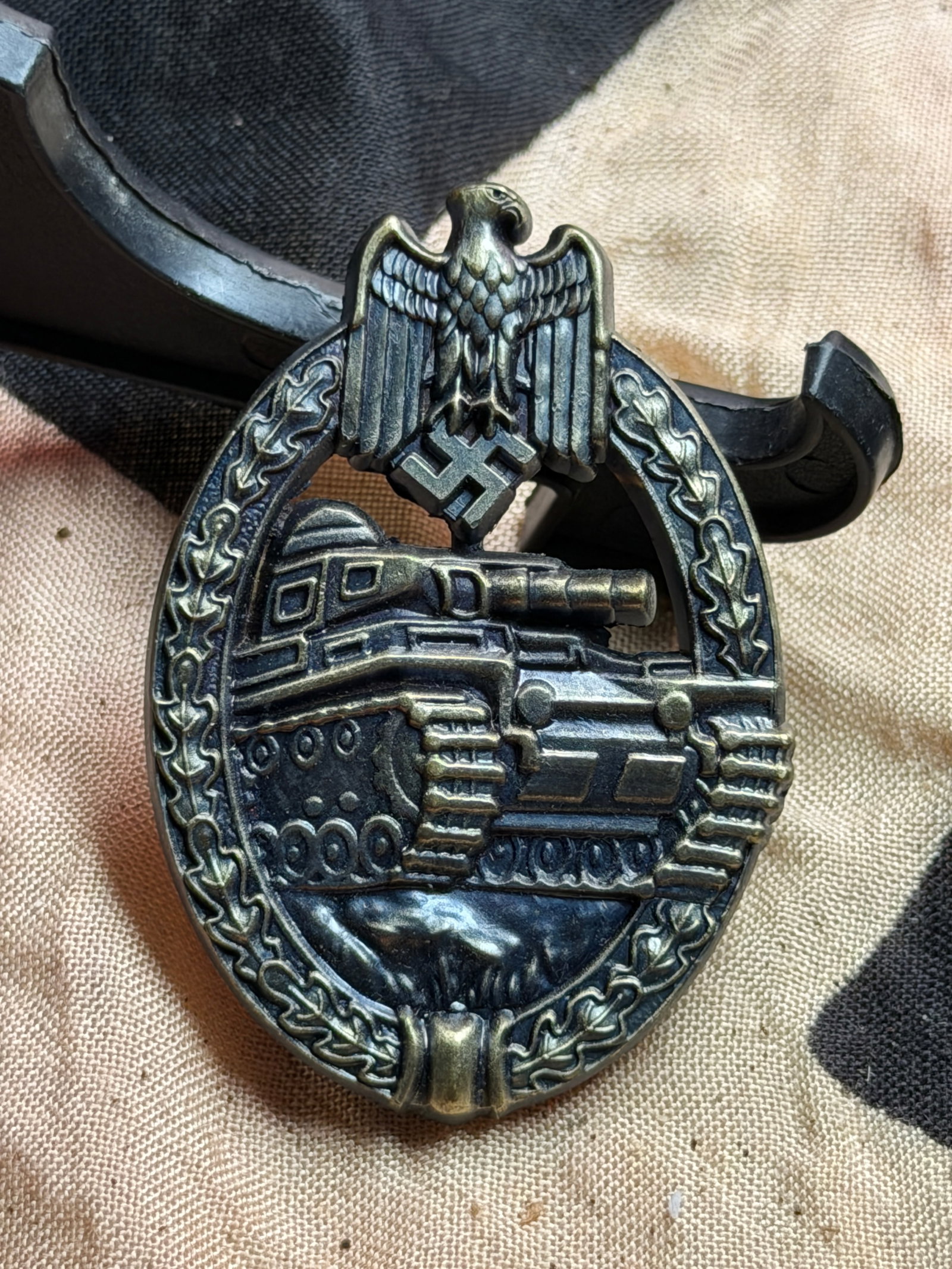 WW2 German Panzer Assault Badge (Panzerkampfabzeichen): This artifact is a German Panzer Assault Badge (Panzerkampfabzeichen), awarded during the Second World War to members of armored units for participation in combat operations. Instituted in 1939, the b