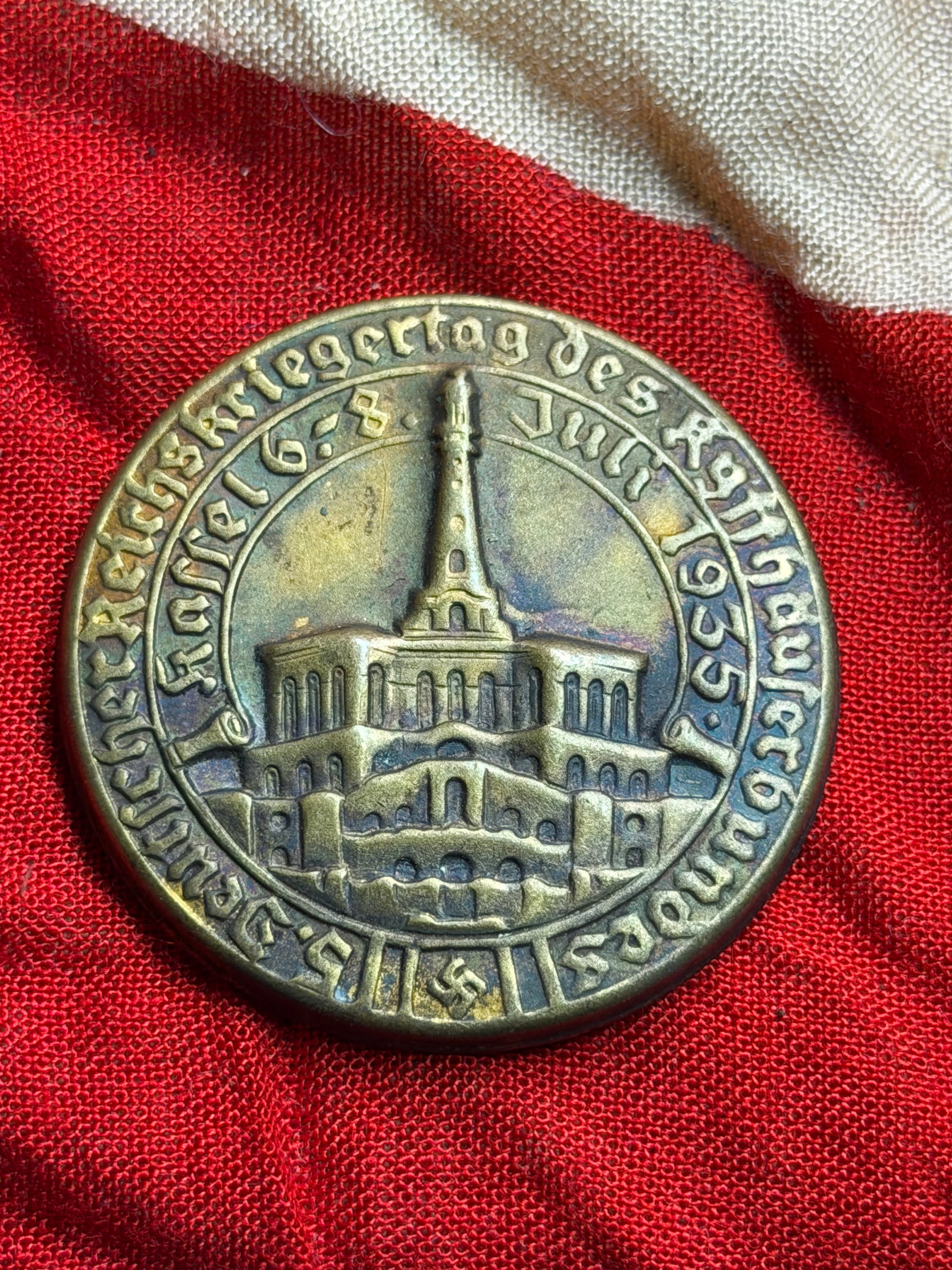 WW2 Day Badge (Tinnie) from the 5th German Imperial Warrior Day, Kassel, 1935: This circular metal day badge (“Tinnie”) was issued for the 5th German Imperial Warrior Day (5. Deutscher Reichskriegertag) organized by the Kyffhäuserbund , held in Kassel in 1935 . The Kyff