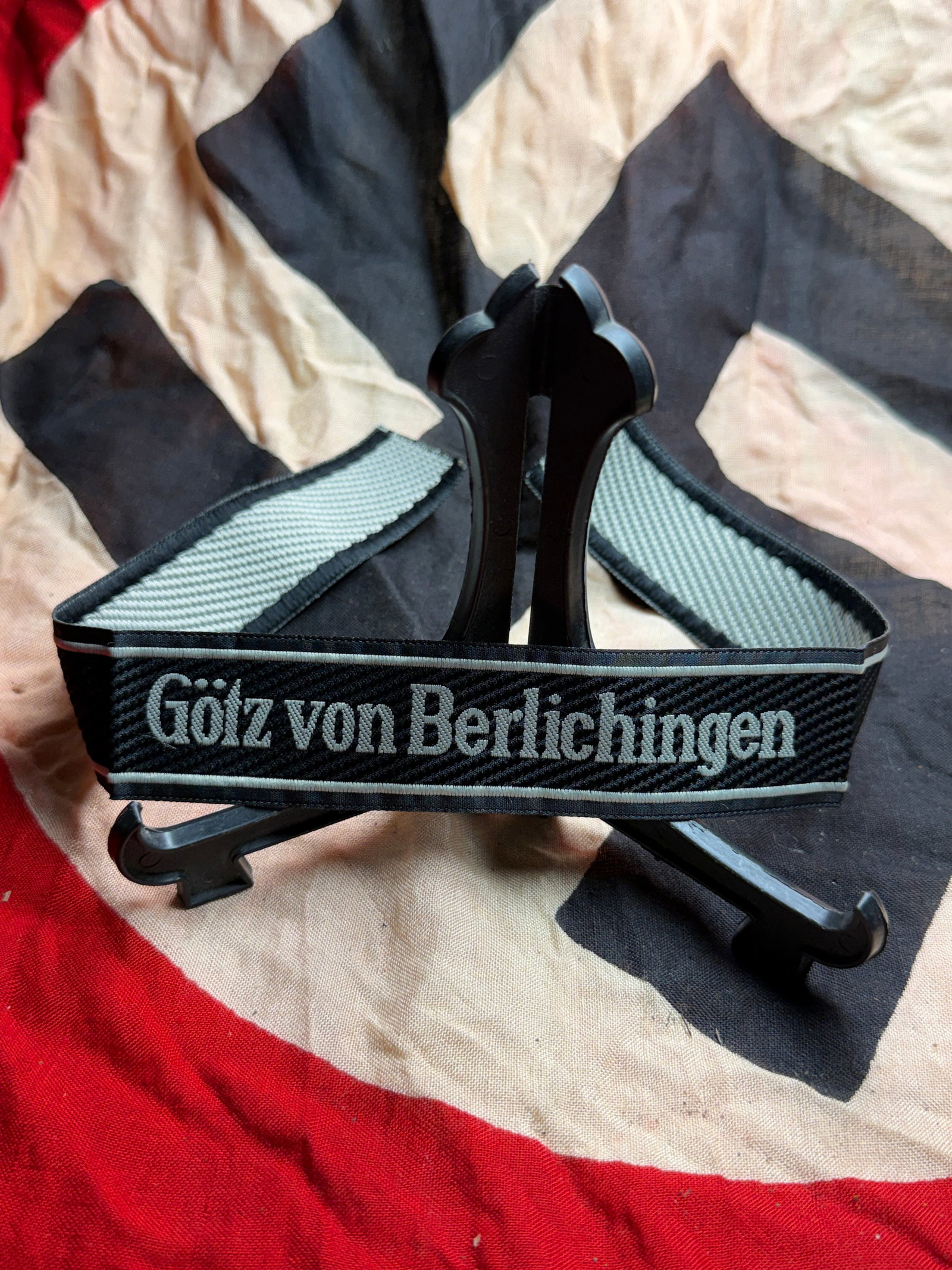 WW2 Waffen-SS Cuff Title “Götz von Berlichingen?? By BEVO WUPPERTAL: This woven cuff title ( Ärmelstreifen ) bears the inscription “Götz von Berlichingen” and was worn by members of the 17. SS-Panzergrenadier-Division “Götz von Berlichingen.” The div