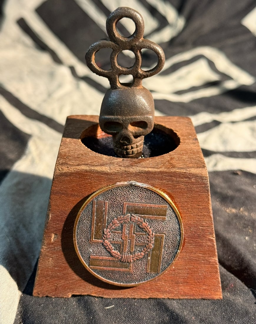 WW2 German Totenkopf SS Officers Desk Ornament: WW2 German Totenkopf SS Officers Desk Ornament. A rare find. Shows good patina throughout. Please view all detailed pictures. A rare example of the time period. Note: In-house shipping is available on