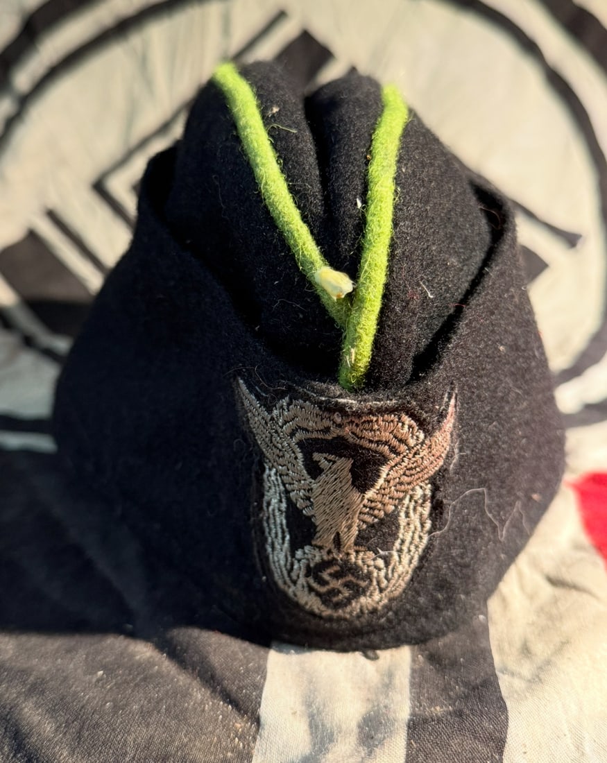 SCARCE WW2 GERMAN WAFFEN-SS POLICE SIDE CAP WITH RZM PAPER TAG: SCARCE WW2 GERMAN WAFFEN-SS POLICE SIDE CAP WITH RZM PAPER TAG. SHOWS GOOD WEAR AND USE WITH A BEAUTIFUL OVERALL PATINA. HAS THE RZM PAPER TAG ATTACHED ON THE INSIDE. Note: In-house shipping is availa