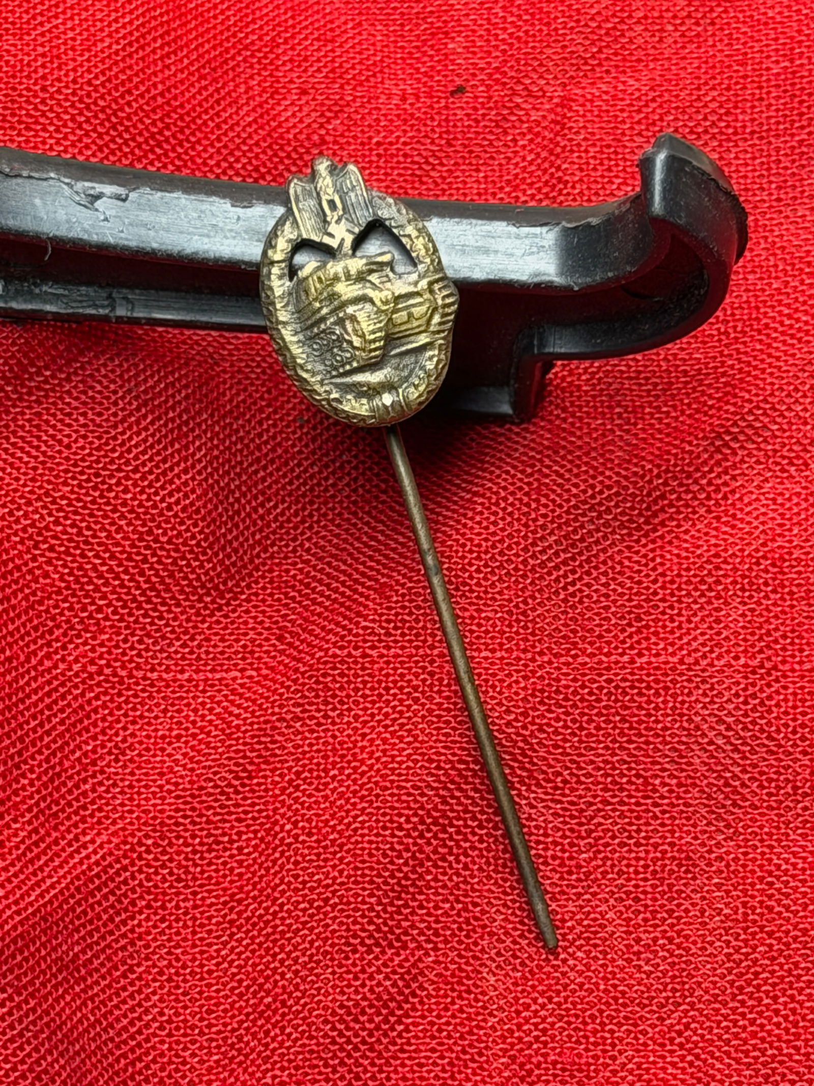 WW2 German Miniature Panzer Assault Badge Stickpin (Panzerkampfabzeichen), Nazi Germany, c.: This small metal stickpin represents a miniature version of the German Panzerkampfabzeichen (Panzer Assault Badge), an award instituted in 1939 to recognize armored troops for participation in combat