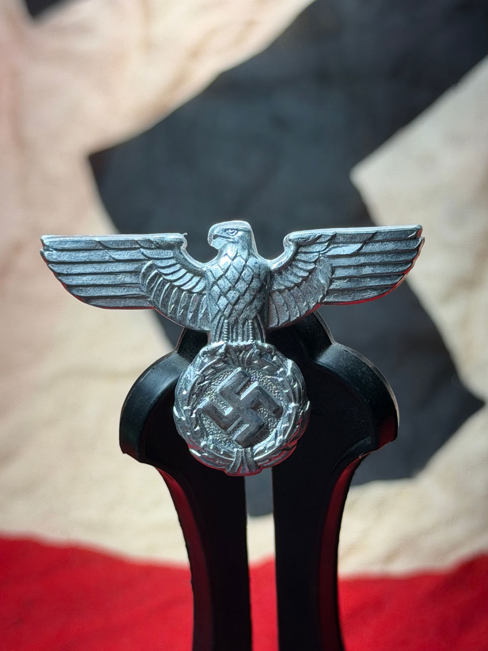 German Army (Heer) Cap Eagle Insignia (Hoheitsadler), World War II: This metal cap eagle, or Hoheitsadler, was worn by personnel of the German Army (Heer) during the Second World War. Cast in lightweight metal, the insignia depicts a stylized eagle with outstretched w