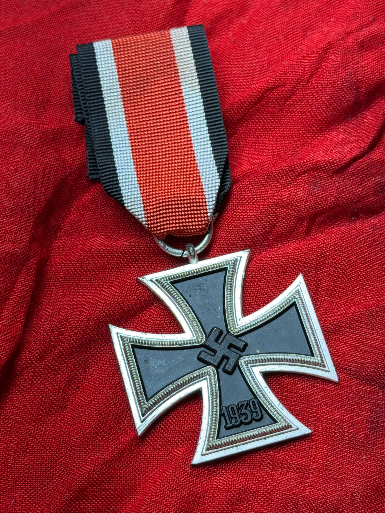 WW2 German Iron Cross, Second Class (1939) With Ribbon: This Iron Cross, Second Class (Eisernes Kreuz II. Klasse), was instituted in 1939 as a renewal of Prussia’s historic military decoration first created in 1813. Awarded to members of the German armed