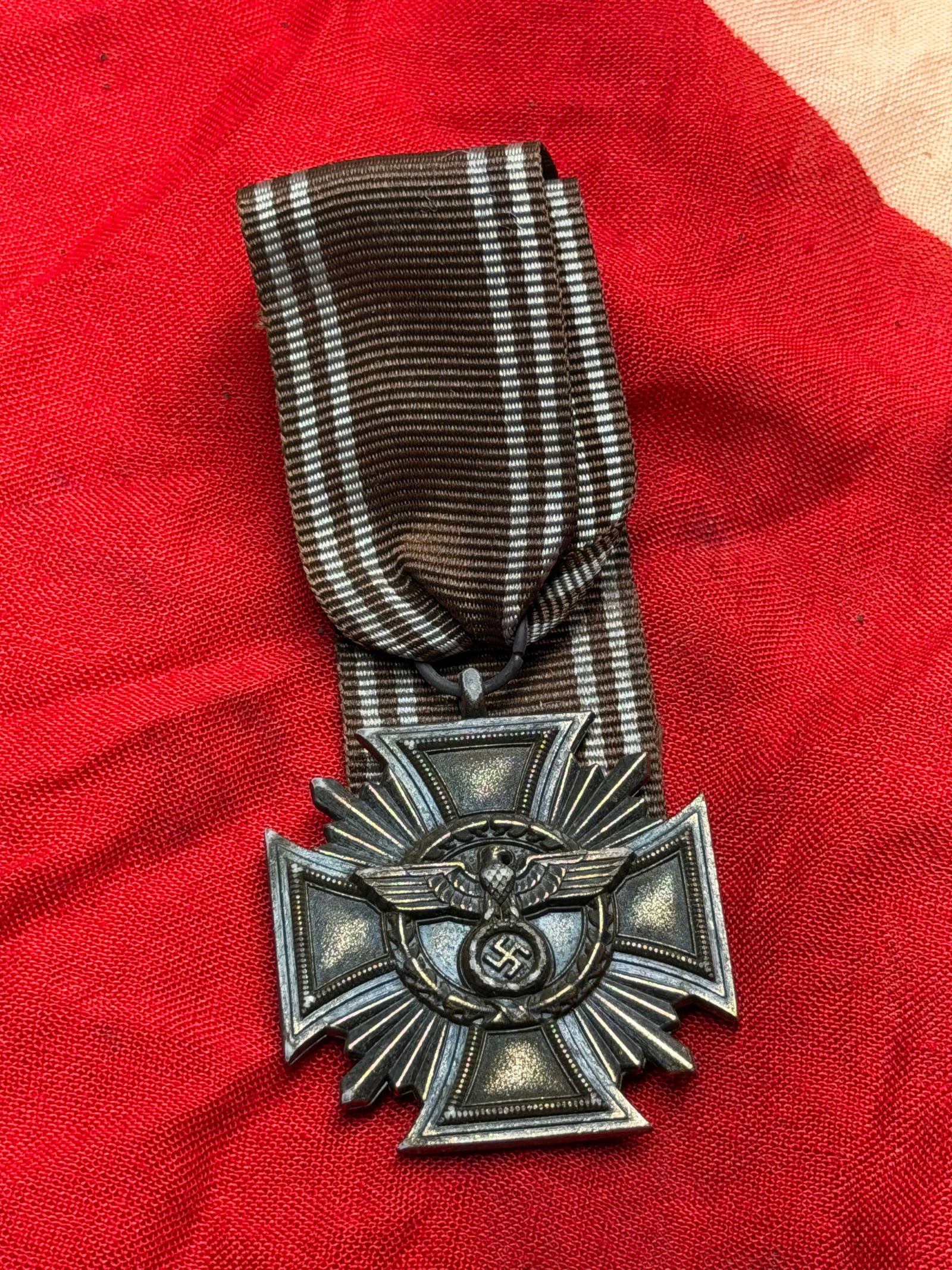 WW2 German NSDAP Long Service Award, 10 Years (Dienstauszeichnung der NSDAP): This decoration is a German National Socialist German Workers’ Party (NSDAP) Long Service Award for 10 years of service, instituted in 1939. The award was intended to recognize sustained membership