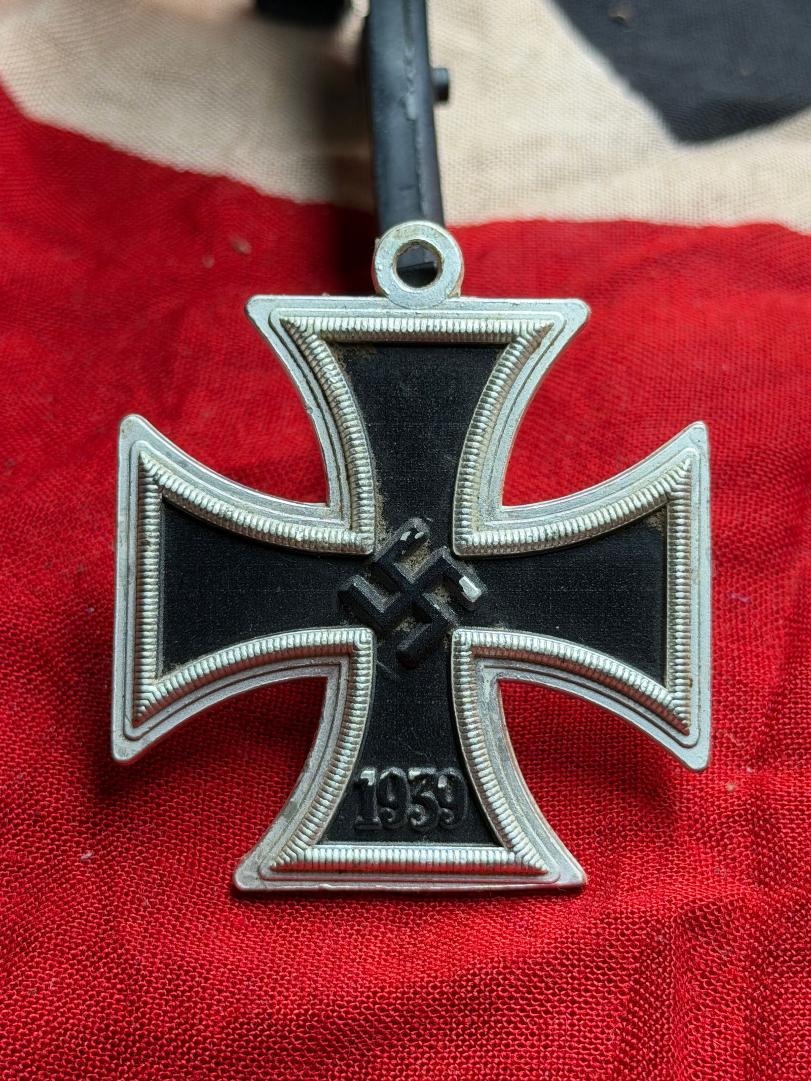 WW2 German Iron Cross, Second Class (Eisernes Kreuz II. Klasse): Iron Cross, Second Class, instituted in 1939 by Nazi Germany at the outbreak of the Second World War. The medal revives the historic Iron Cross design first introduced in 1813, featuring a blackened i