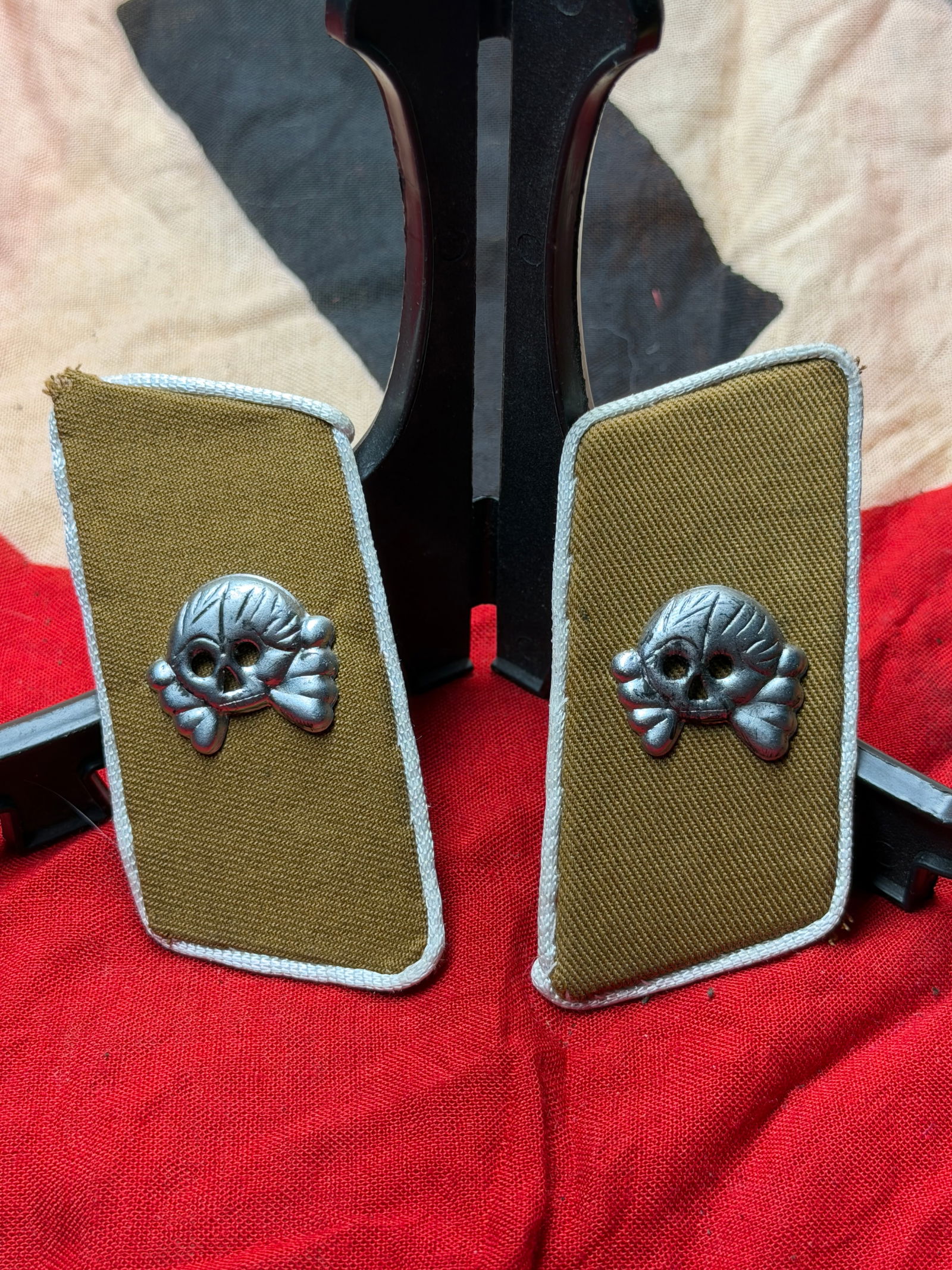 WW2 German SS Totenkopf Collar Tabs (Skull Insignia), Germany, c. 1939–1945 With RZM Paper Tag: This matched pair of German SS collar tabs bears the Totenkopf (death’s head) insignia, a symbol historically associated with the Schutzstaffel (SS) and most prominently worn by units of the SS-Tote