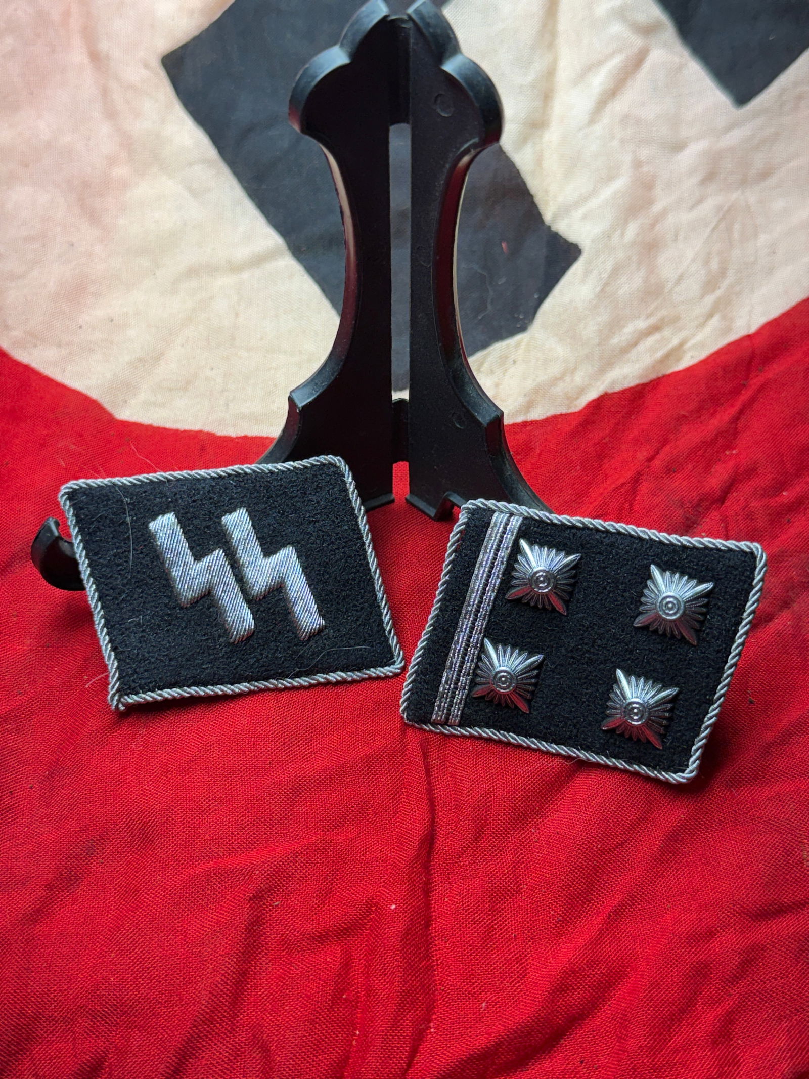 WW2 German SS Collar Tabs with RZM Tags (Schutzstaffel Insignia), c. 1939–1945: This matched set of Waffen-SS collar tabs dates to the period of the Second World War and represents rank and organizational insignia worn on the collar of the SS uniform. One tab bears the embroidere