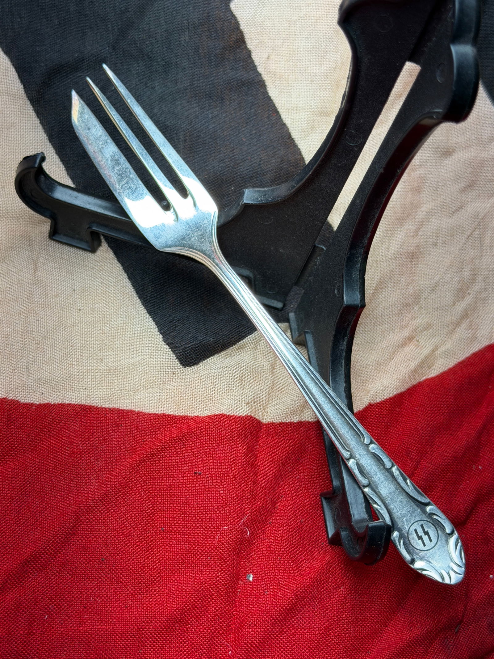 WW2 German Tableware of the Waffen-SS: Mess Hall Fork with SS Runes: This metal dining fork is a piece of everyday tableware produced for use by members of the Waffen-SS during the Second World War. The handle bears the SS runes, an emblem of the Schutzstaffel, integra