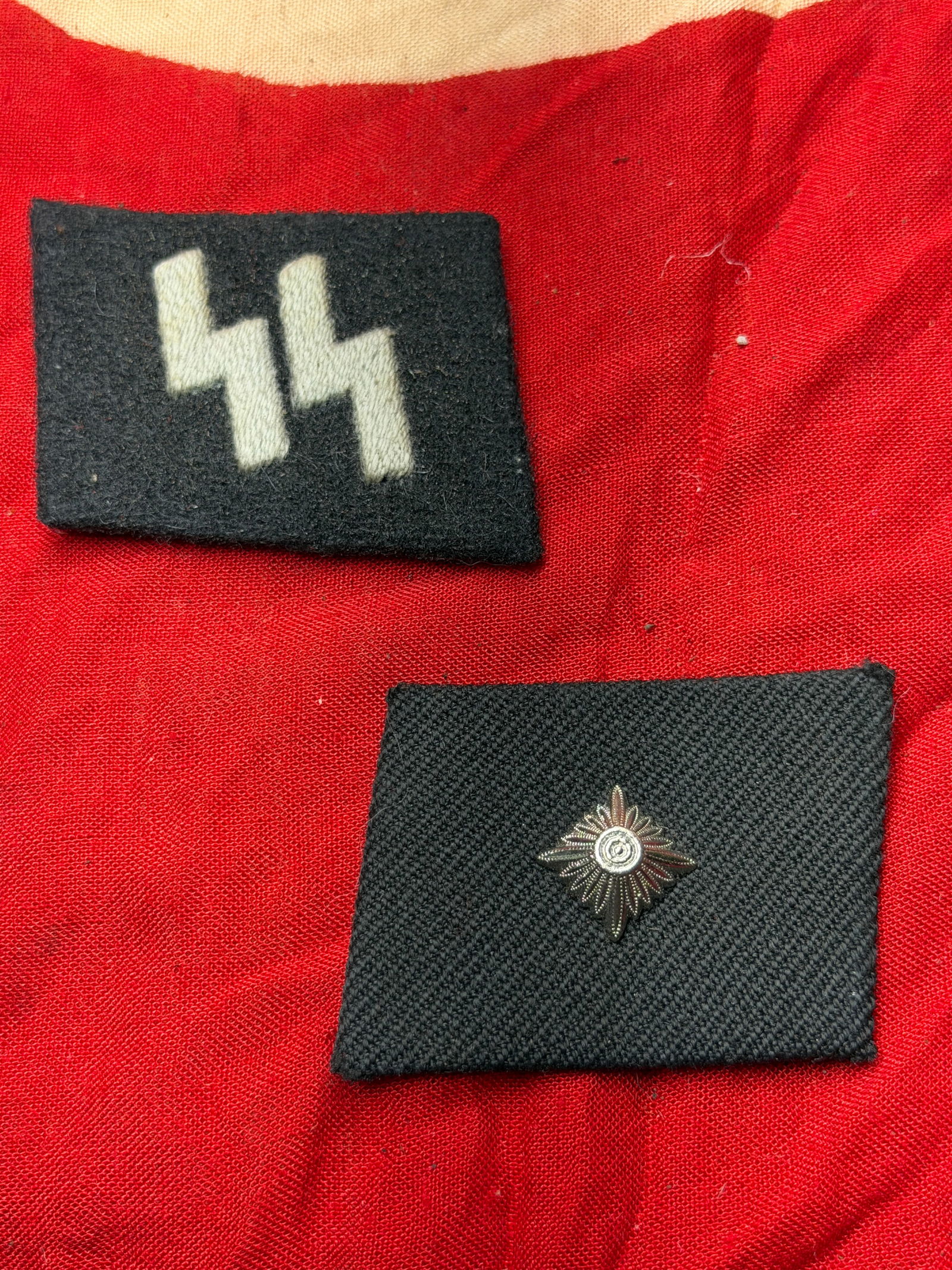 WW2 German Waffen-SS Collar Tabs with RZM Identification Tags: Waffen-SS collar tabs date to the period of the Second World War (circa 1939–1945) and were worn as part of the uniform of the Schutzstaffel (SS), a paramilitary organization of Nazi Germany. The bl