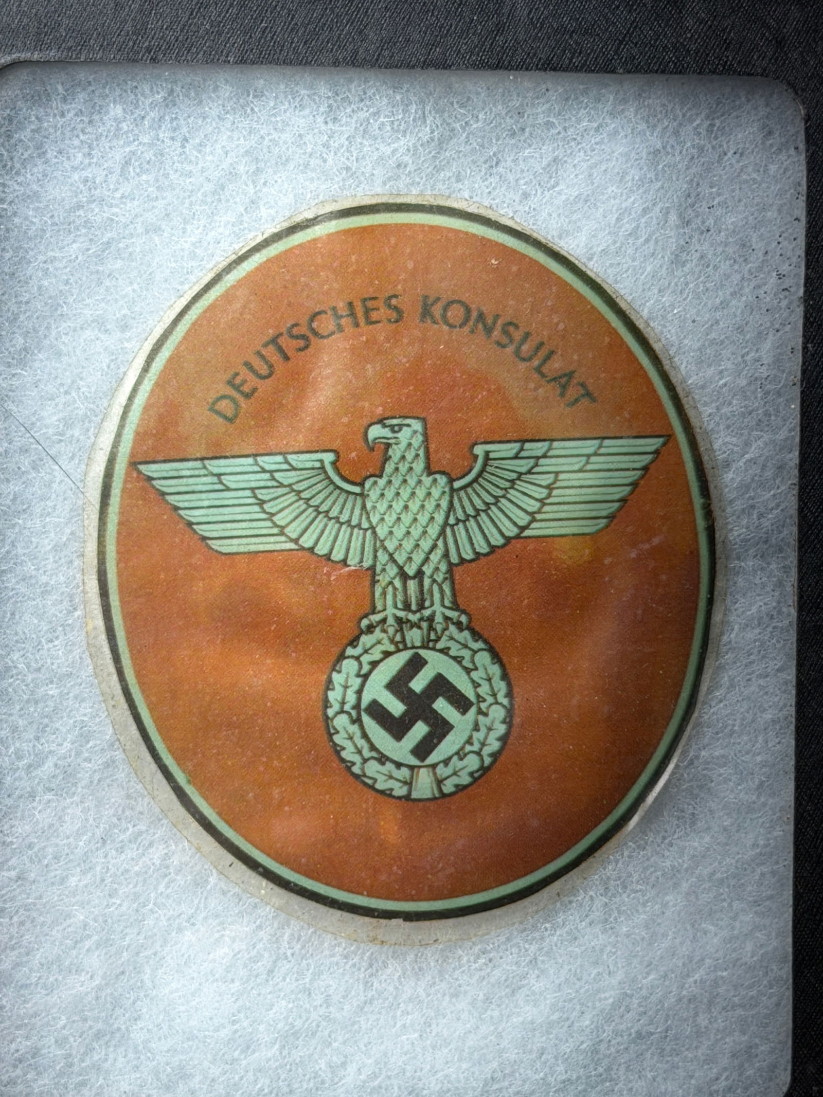 WW2 German Consular Identification Seal (Deutsches Konsulat), Third Reich Era: This circular paper consular seal bears the inscription “Deutsches Konsulat” (“German Consulate”) and features the national eagle clutching a wreath enclosing a swastika, an emblem emp