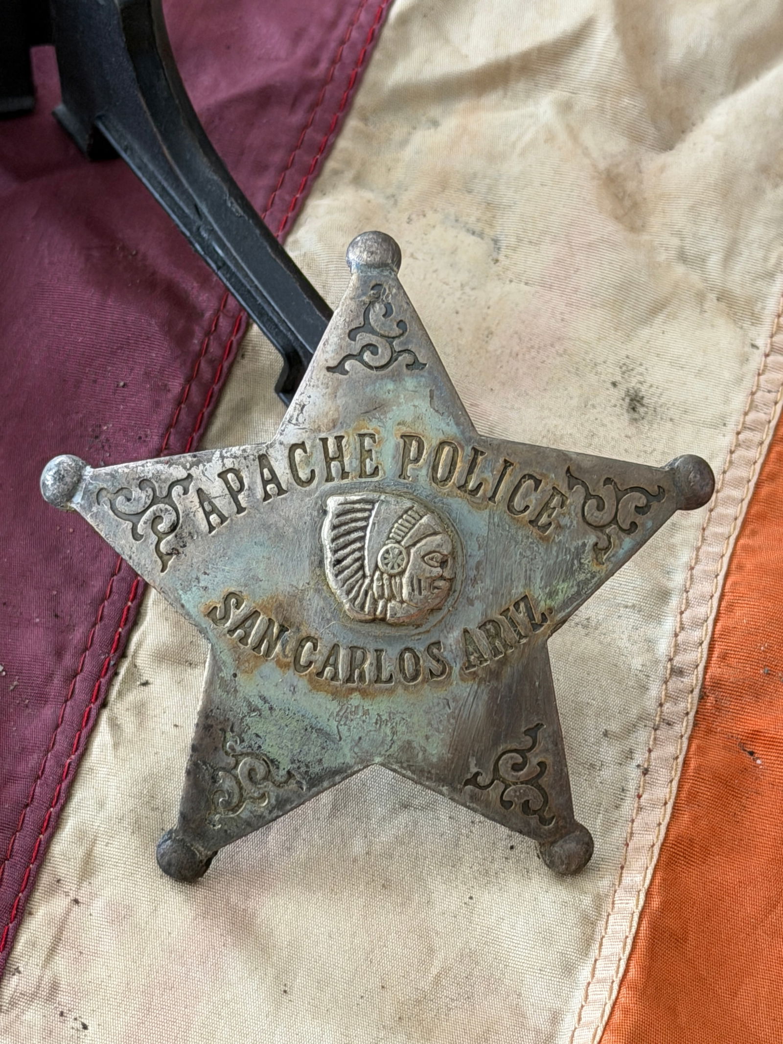 1800's Apache Police Star Badge, San Carlos Agency, Arizona Territory: This five-pointed star badge was issued to the Apache Police at the San Carlos Agency in Arizona Territory during the late 19th century, a period commonly referred to as the Indian Wars era. Cast in m