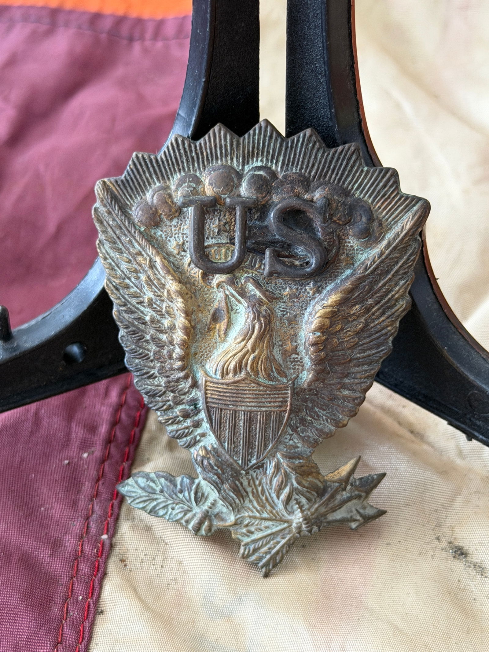 Civil War Union “Jeff Davis?? Hardee Hat Side Insignia: This cast brass insignia dates to the American Civil War (1861–1865) and is identified as a Union Army “Jeff Davis” pattern Hardee hat side badge. The device depicts a spread-wing eagle with