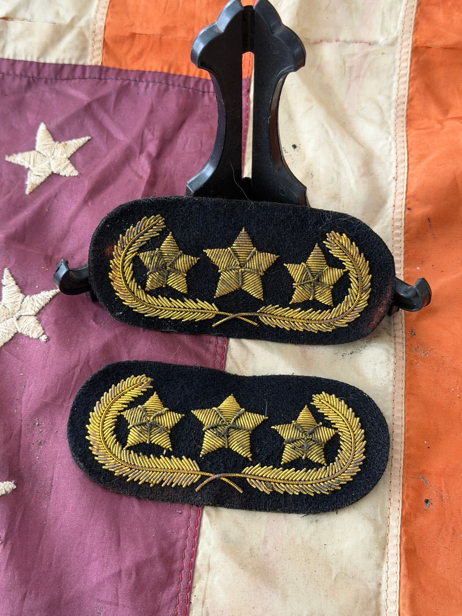 Civil War Confederate States Army Major General Shoulder Boards by J. H. Silverberg: This matched pair of embroidered shoulder boards represents the rank insignia of a Major General in the Confederate States Army (CSA) during the American Civil War. Each board displays three embroider