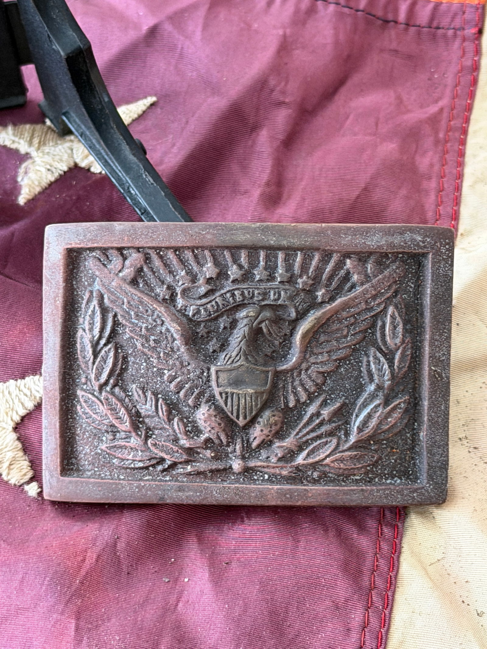 Civil War Union Cavalry Officer’s Sword Belt Plate: This rectangular brass sword belt plate was worn by officers of the United States Cavalry during the American Civil War. The plate features a finely cast American eagle with outstretched wings, bearin