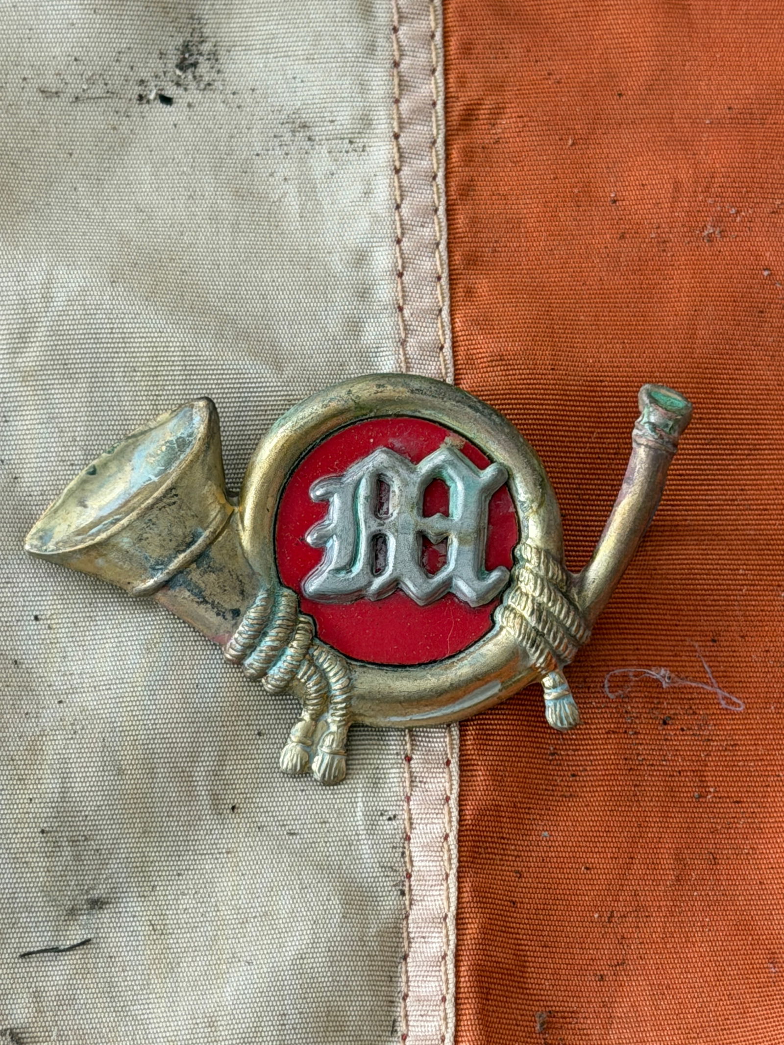United States Marine Corps Badge, Civil War Era: Civil War–period badge represents the United States Marine Corps, one of the nation’s oldest military institutions. The design features a brass hunting horn (bugle) encircling a red field with the