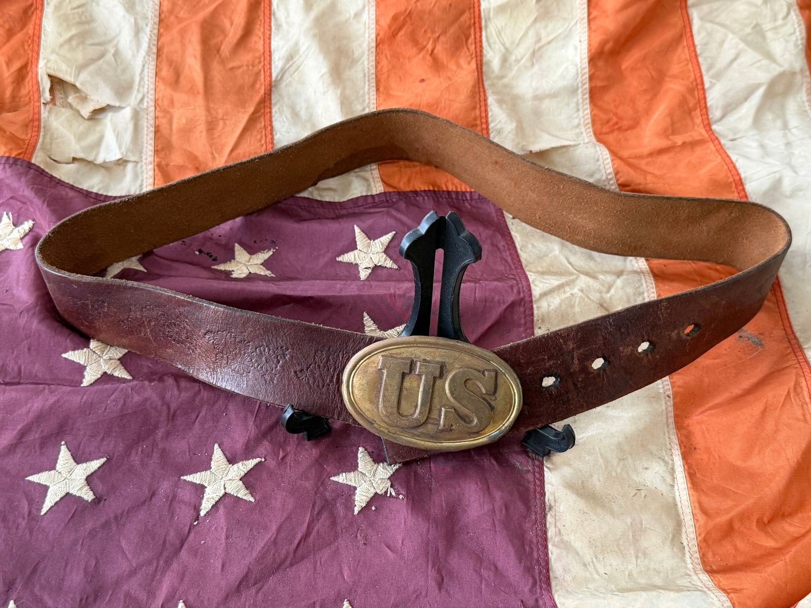 Civil War Union Army Waist Belt with "U.S." Buckle: Union Army waist belt and brass “U.S.” belt buckle date to the American Civil War and represent standard enlisted and officer accoutrements of the United States Army. The oval, die-struck bras